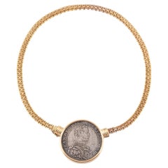 Collier de grandes pièces de monnaie en or jaune 18 carats et argent
