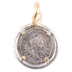 Moneda romana de oro amarillo y plata de 18 quilates Denario de Septimio Severo 193-211 d.C.