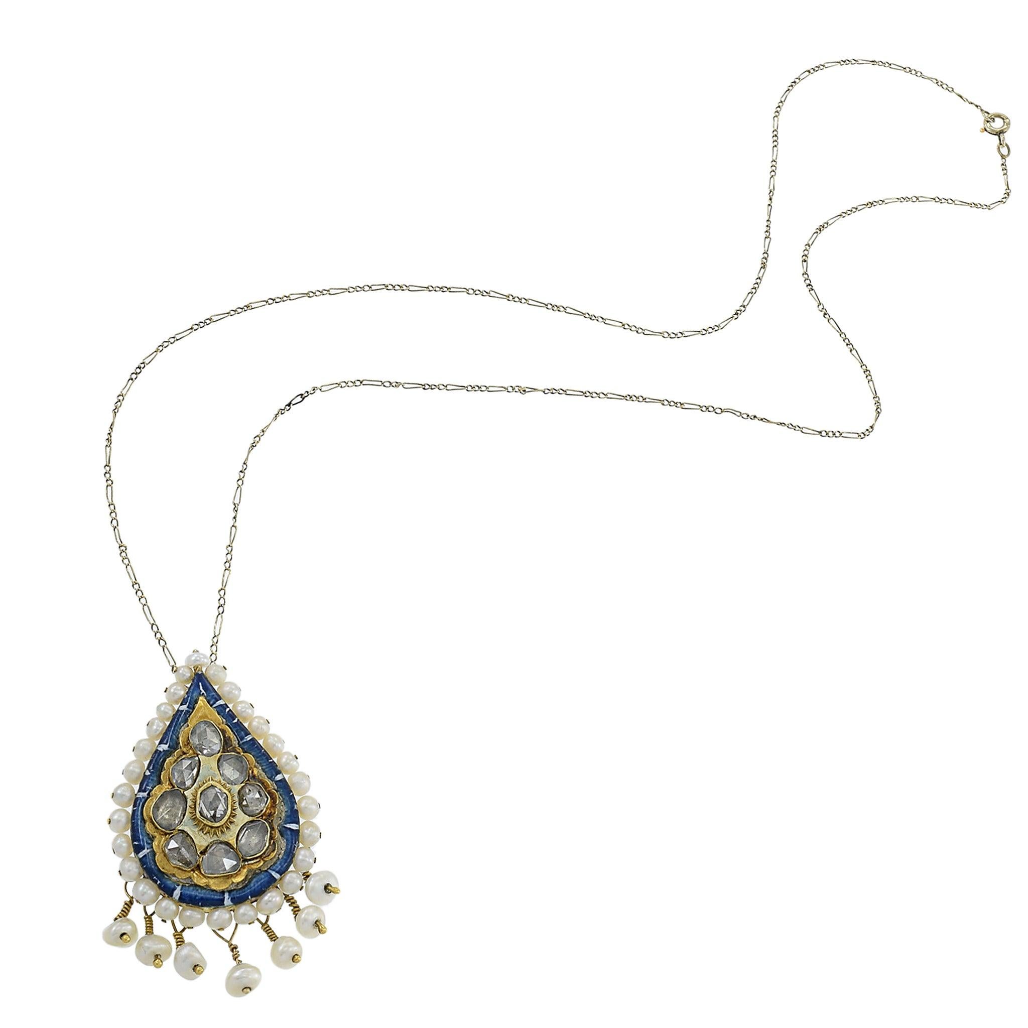 This exquisite antique Victorian era pendant, weighing 10.14 grams, features intricate enamel work, 1.80 carats of rose cut diamonds, and 3mm pearls, all set in 18KT yellow gold. The delicate design showcases the timeless elegance and craftsmanship