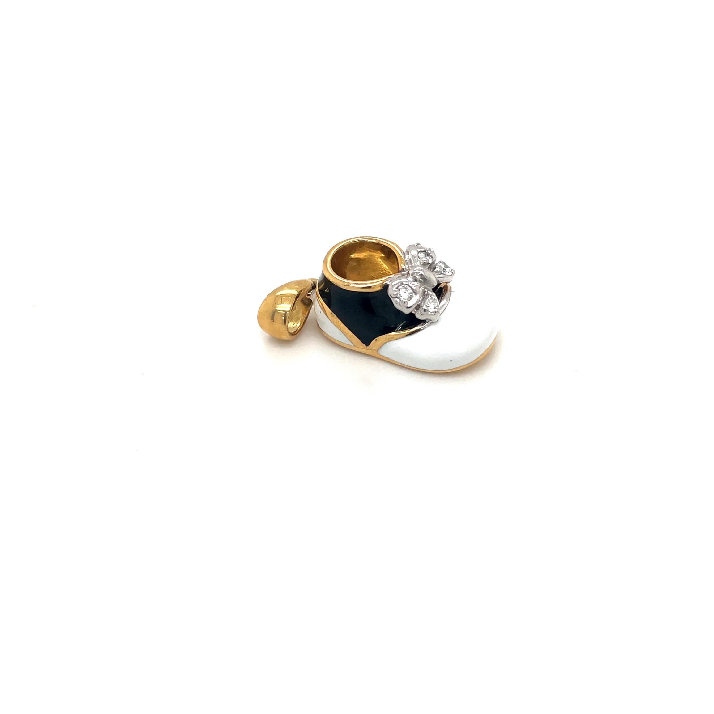 Contemporary 18KT Yellow Gold Baby Shoe Black & White Enamel with 0.12Ct Diamond Bow For Sale