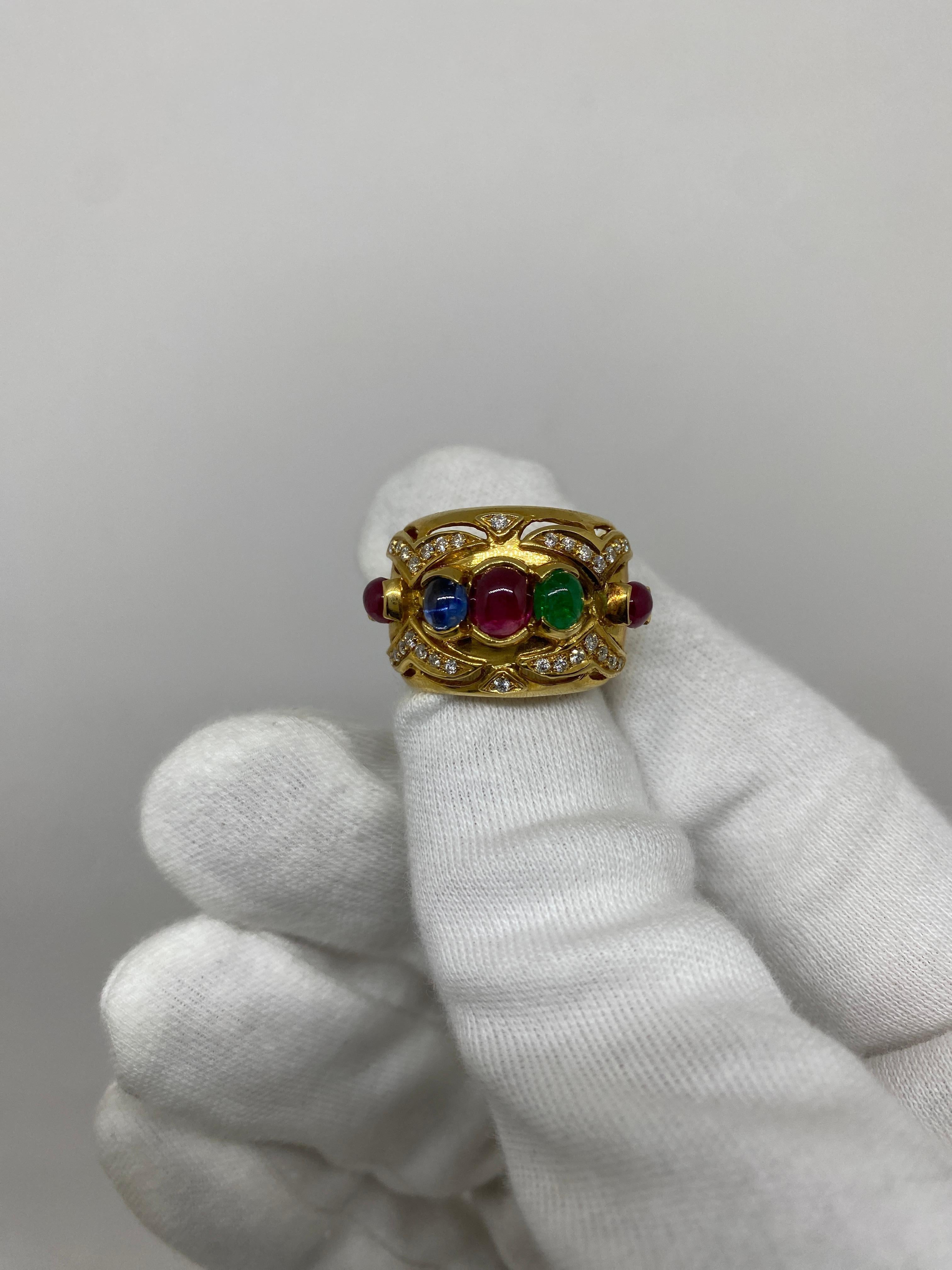 Band ring made of 18kt yellow gold with natural cabochon-cut sapphire and emerald rubies and natural white brilliant-cut diamonds

Welcome to our jewelry collection, where every piece tells a story of timeless elegance and unparalleled