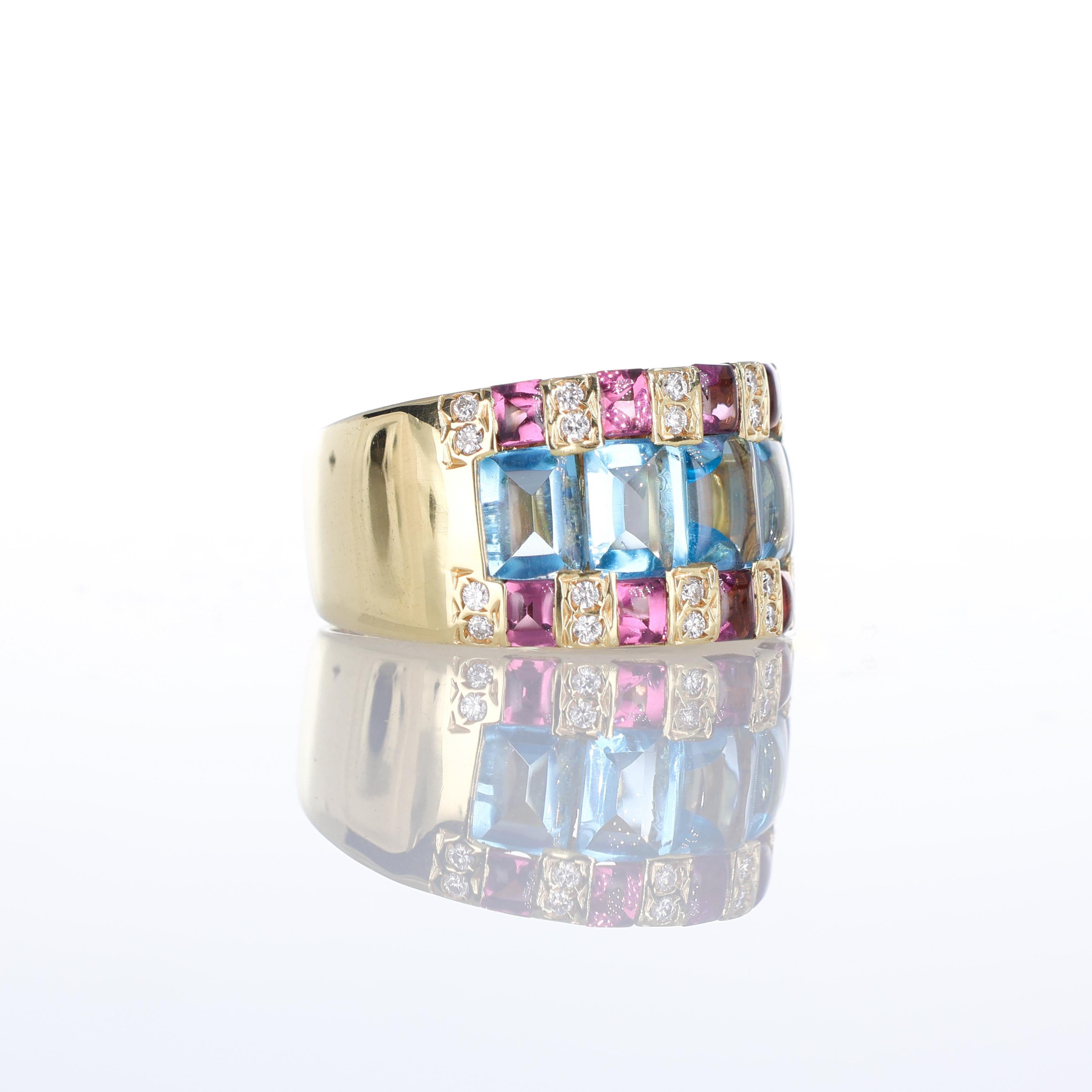Taille brillant Bague en or jaune 18 carats avec topazes bleues, rhodolites et diamants en vente