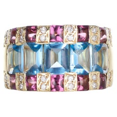 18kt Yellow Gold Band Ring with Blue Topazes, Rhodolites, and Diamonds