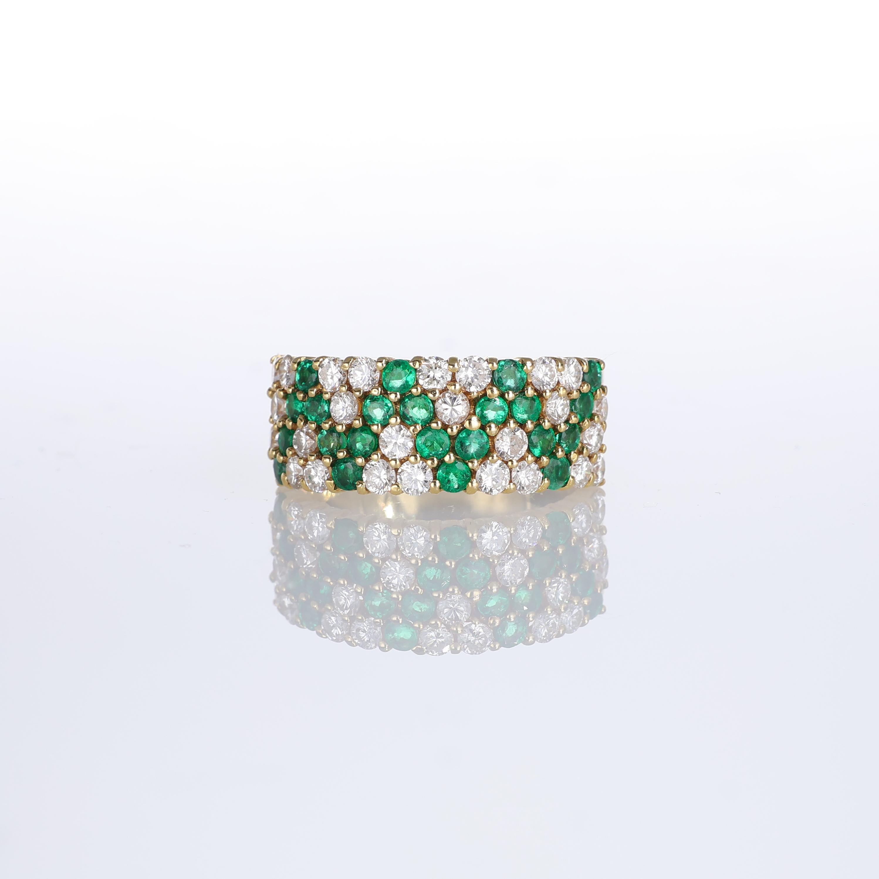 IMPORTANT NOTE:
✔ No additional costs will be added to this order.
✔ Shipping and customs duties are fully covered by us.
--------------------
A striking 18kt yellow gold band ring adorned with a harmonious pavé setting of vivid emeralds, totaling