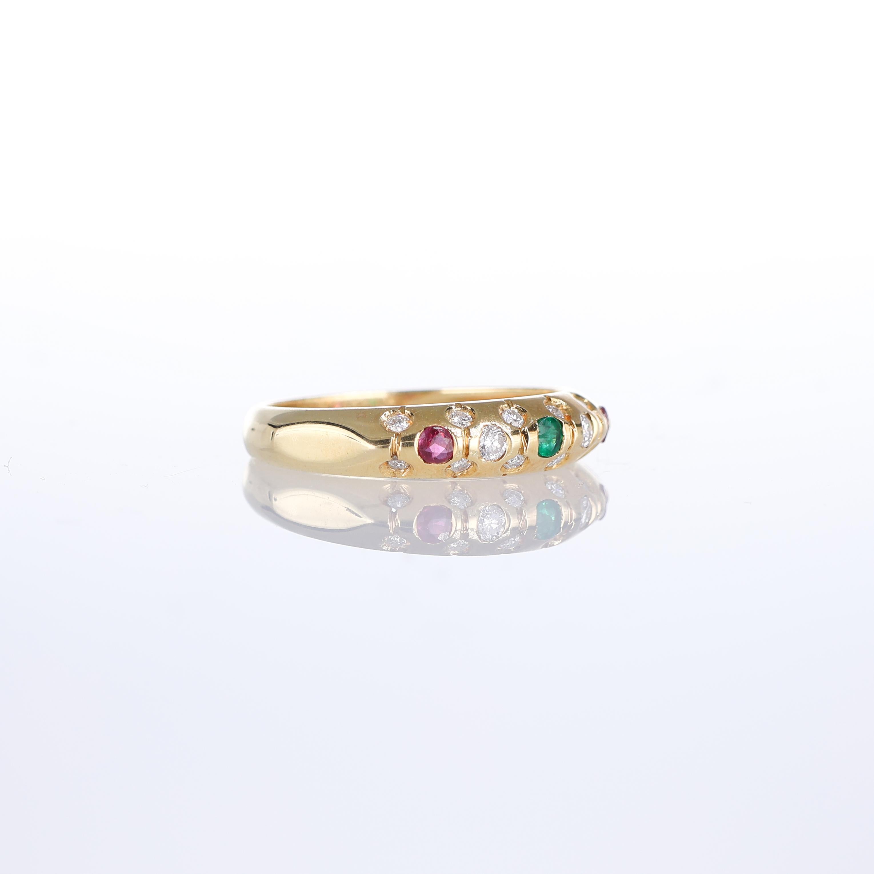 Brilliant Cut 18kt Yellow Gold Band Ring with Emeralds, Rubies, and Diamonds For Sale