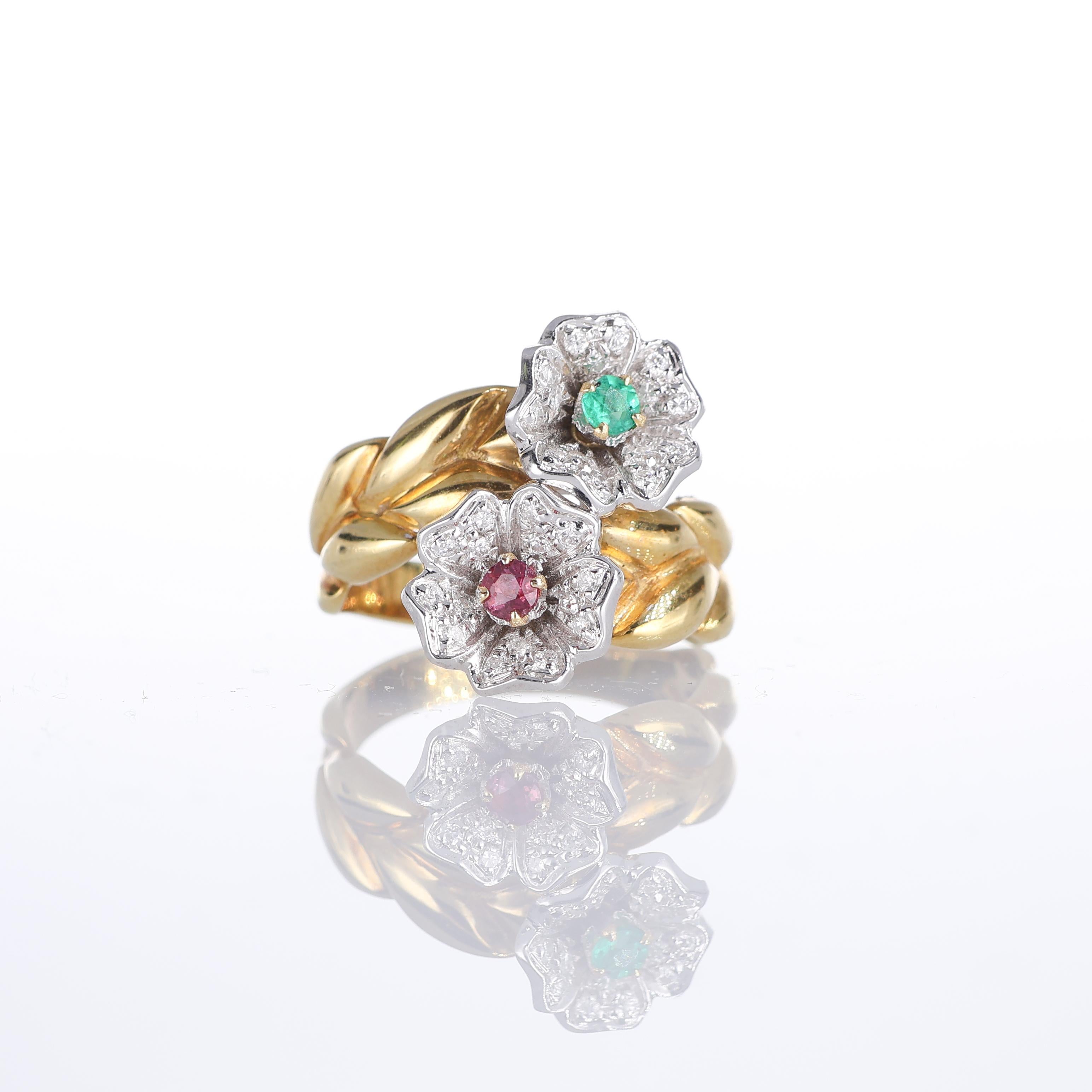 IMPORTANT NOTE:
✔ No additional costs will be added to this order.
✔ Shipping and customs duties are fully covered by us.
--------------------
A charming 18kt yellow gold band ring adorned with two delicate flower motifs, each featuring a vibrant