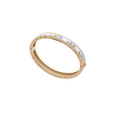 18kt yellow gold bangle, engraved painted in miniature and enamelled by hand