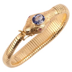 18 Karat Yellow Gold Blue Topaz Ruby Snake Bracelet