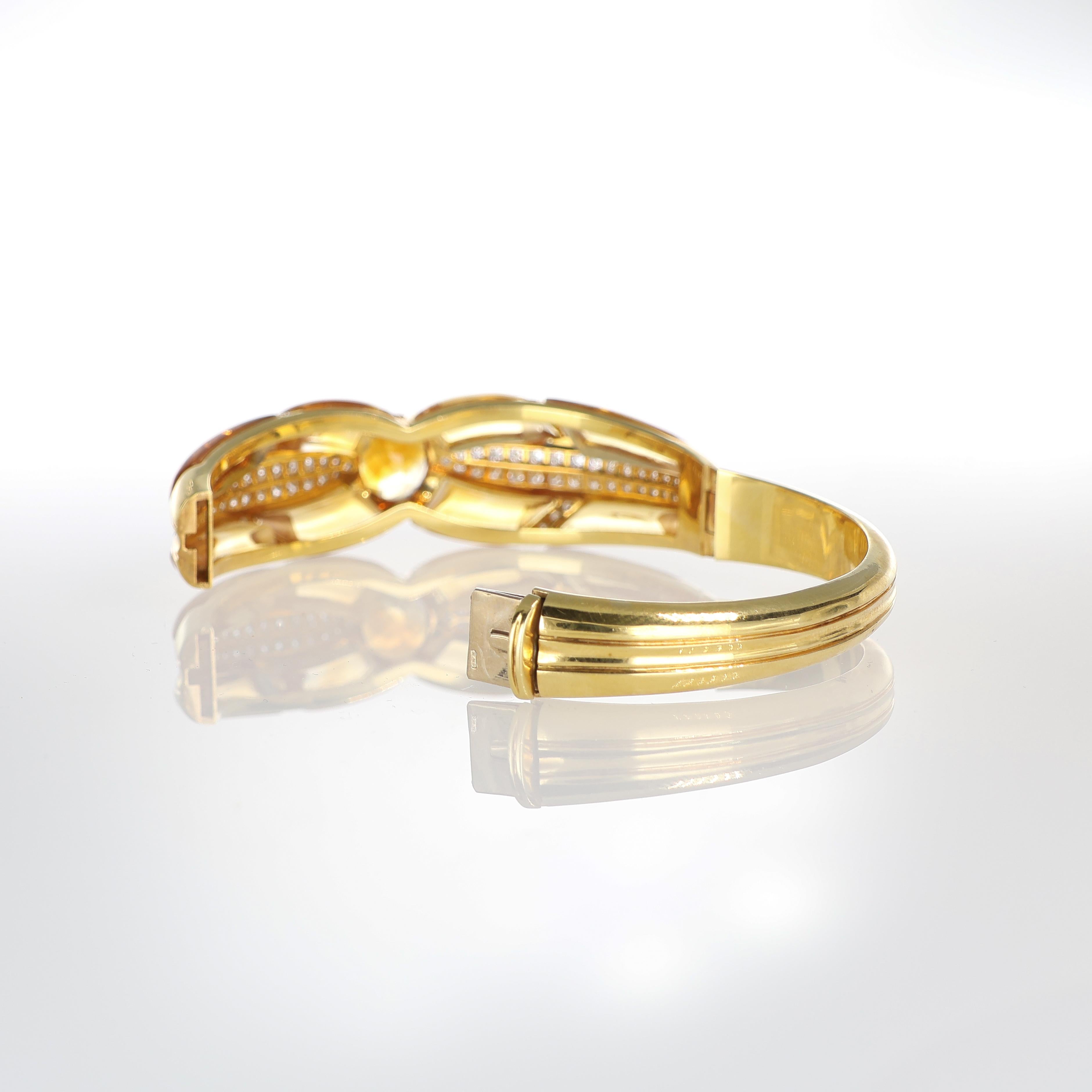 18kt Yellow Gold Bow Motif Rigid Bracelet with Yellow Topaz and Diamonds For Sale 1