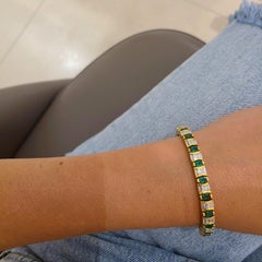 18 Karat Gold Bracelet 5.78 Carat Oval Emeralds and 7.38 Carat Baguette Diamonds