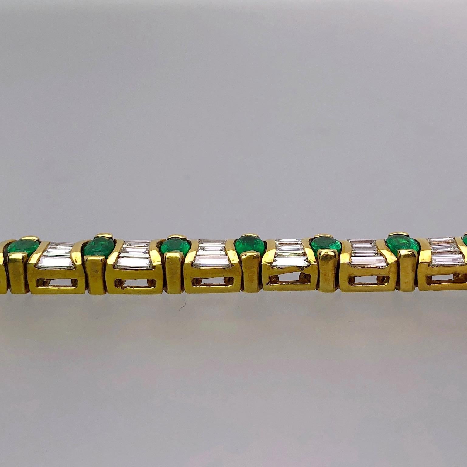 Modern 18 Karat Gold Bracelet 5.78 Carat Oval Emeralds and 7.38 Carat Baguette Diamonds For Sale