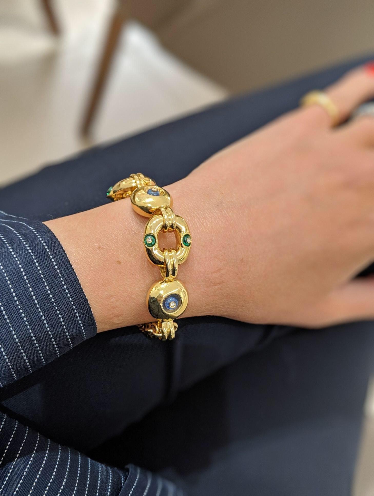 18Kt Yellow Gold Bracelet with 3.15ct of Emerald & Sapphires, .10ct of Diamonds 1