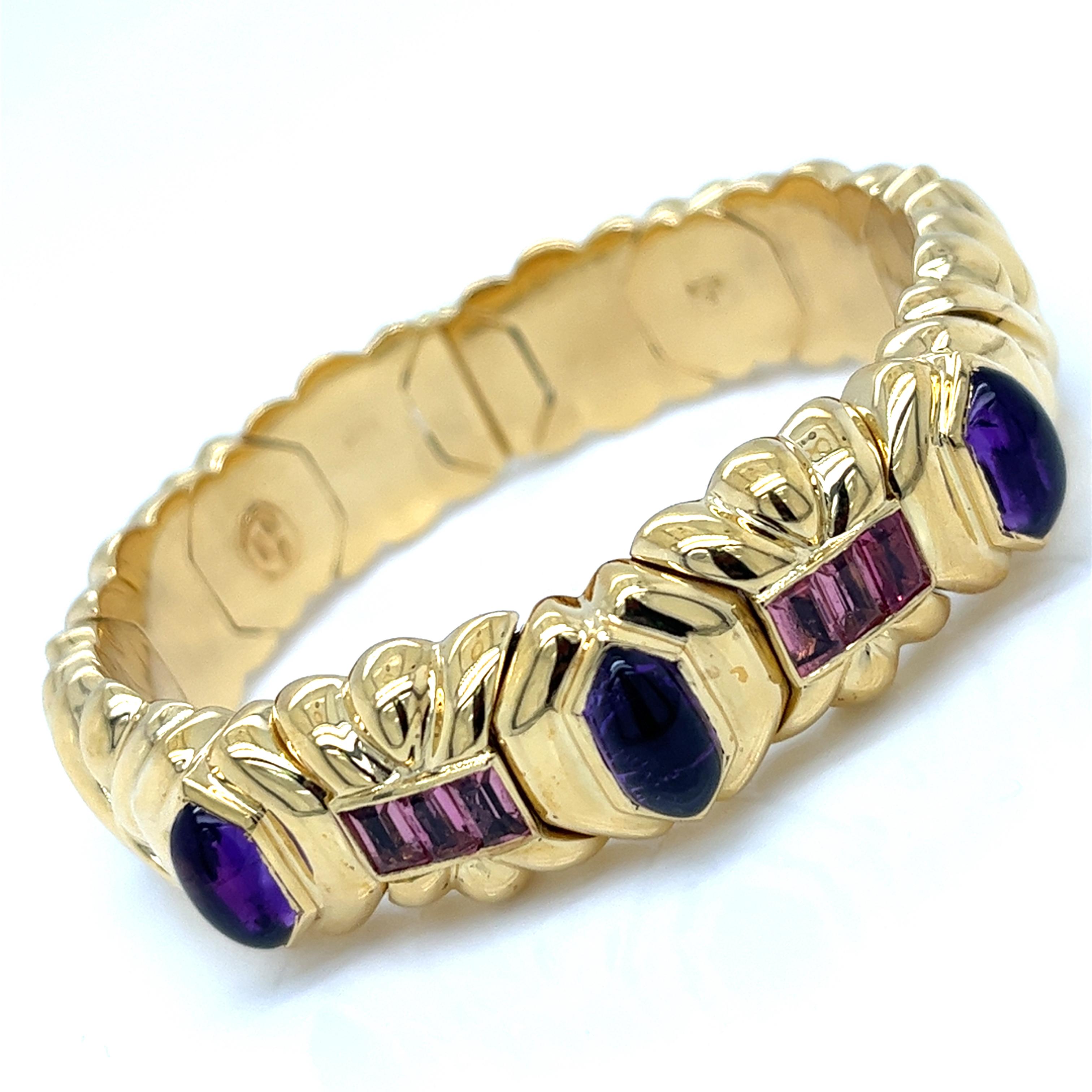 Indulge in the timeless allure of this exquisite Italian bangle bracelet, a testament to 1980s sophistication. Crafted with meticulous attention to detail, it boasts three mesmerizing hexagon-cut amethyst, each a verdant oasis amidst the lustrous