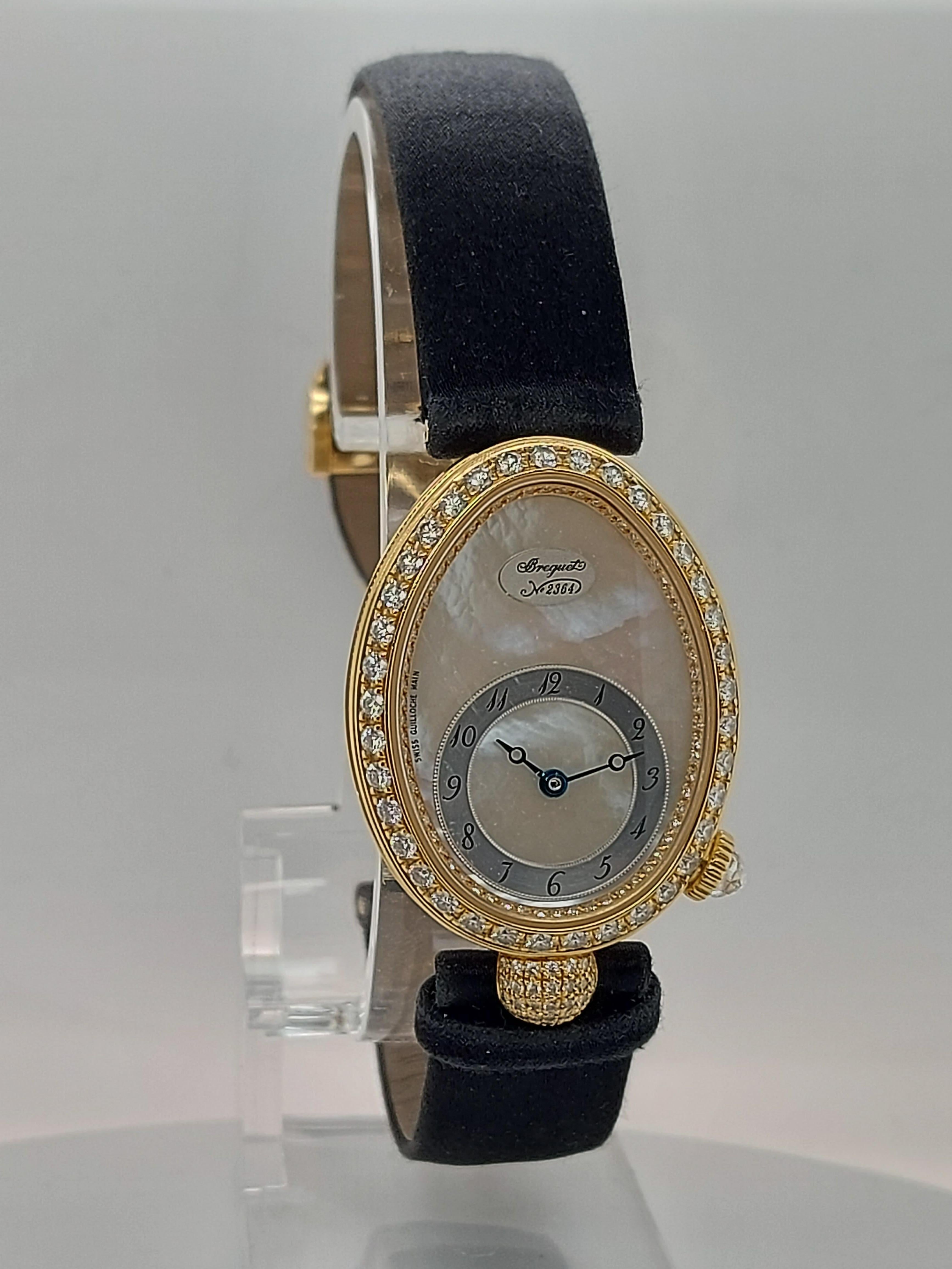 18kt Yellow gold Breguet Reine de Naples, Automatic,Diamonds,MOP Dial, Ref.8928

Reference: 8928

Movement: Automatic, Caliber 596, This watch has a power reserve of approximately 40 hours. 

Functions: Hours, Minutes

Case: 18kt yellow gold oval