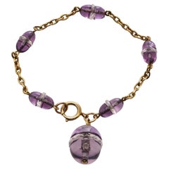 18kt yellow gold cable amethyst bead bracelet. 18kt yellow gold cable amethyst bead bracelet.