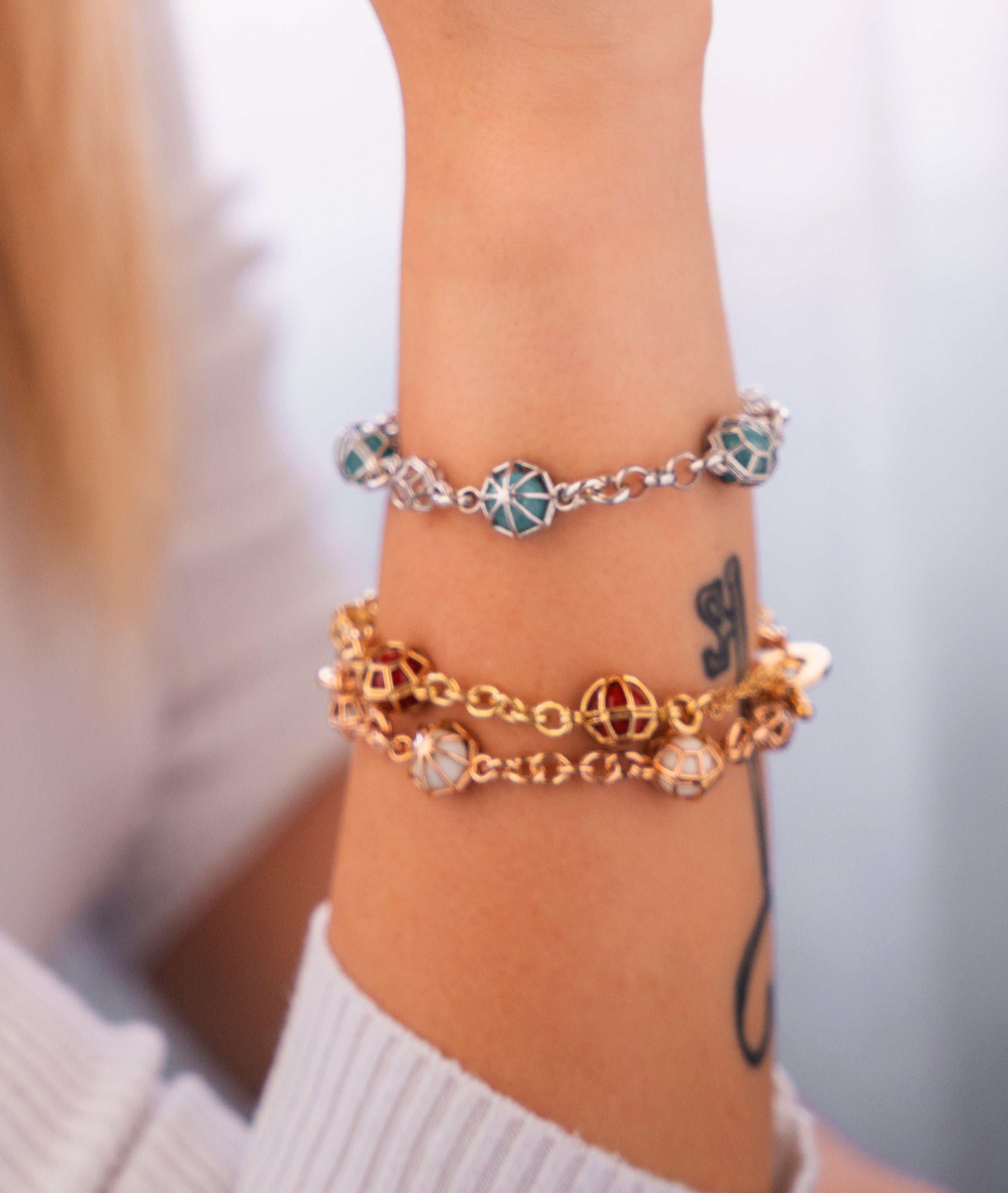 18KT Yellow Gold Chain Bracelet featuring Hematite Spheres 
lenght inches 7