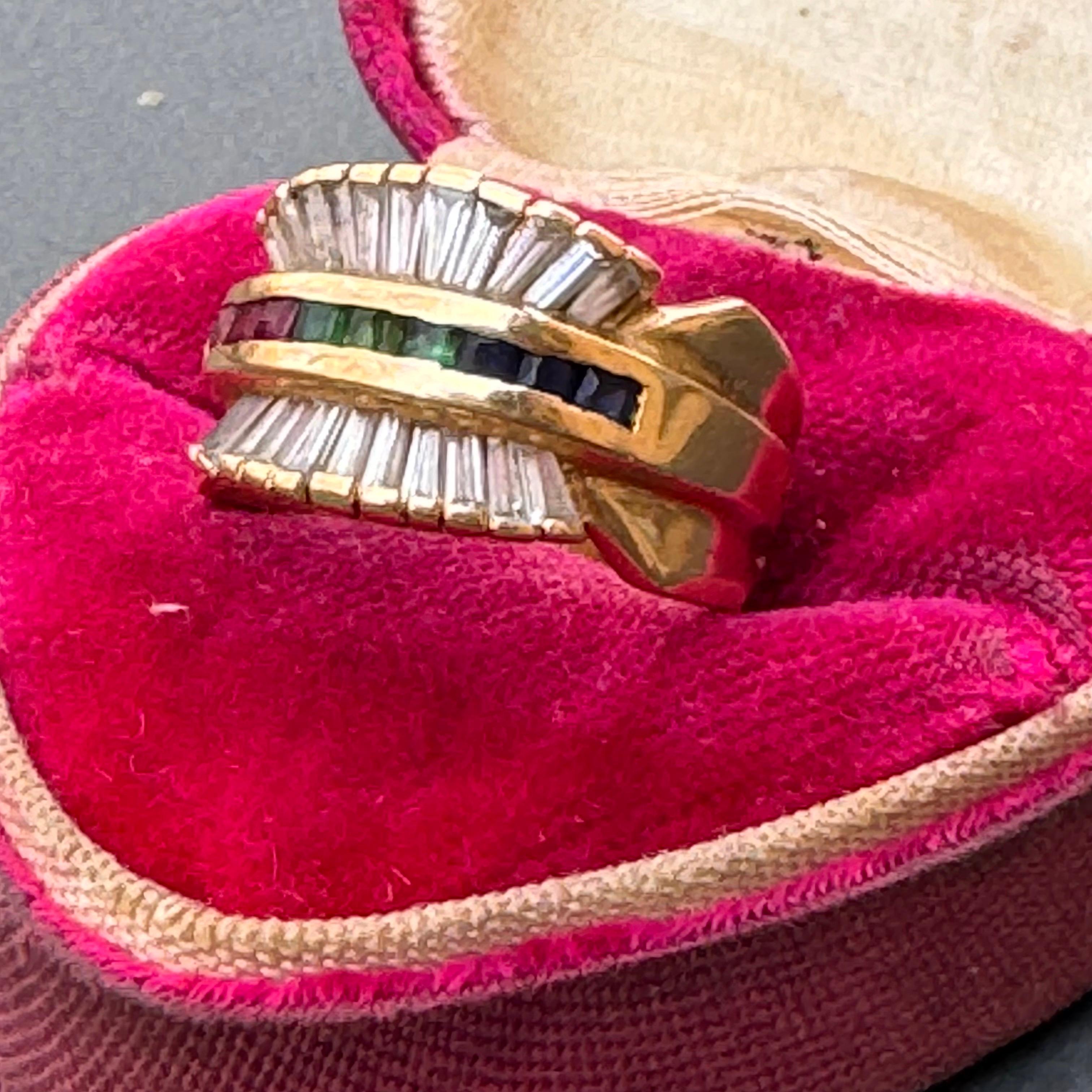 Vintage handmade 18kt solid yellow gold cigar band style ring with white sapphire baguettes and lab created colored stones in center. 
Most likely made in India .

Dates : late 20th century

Measurements:
Ring size 6 1/2 - 7 and measures Bangle