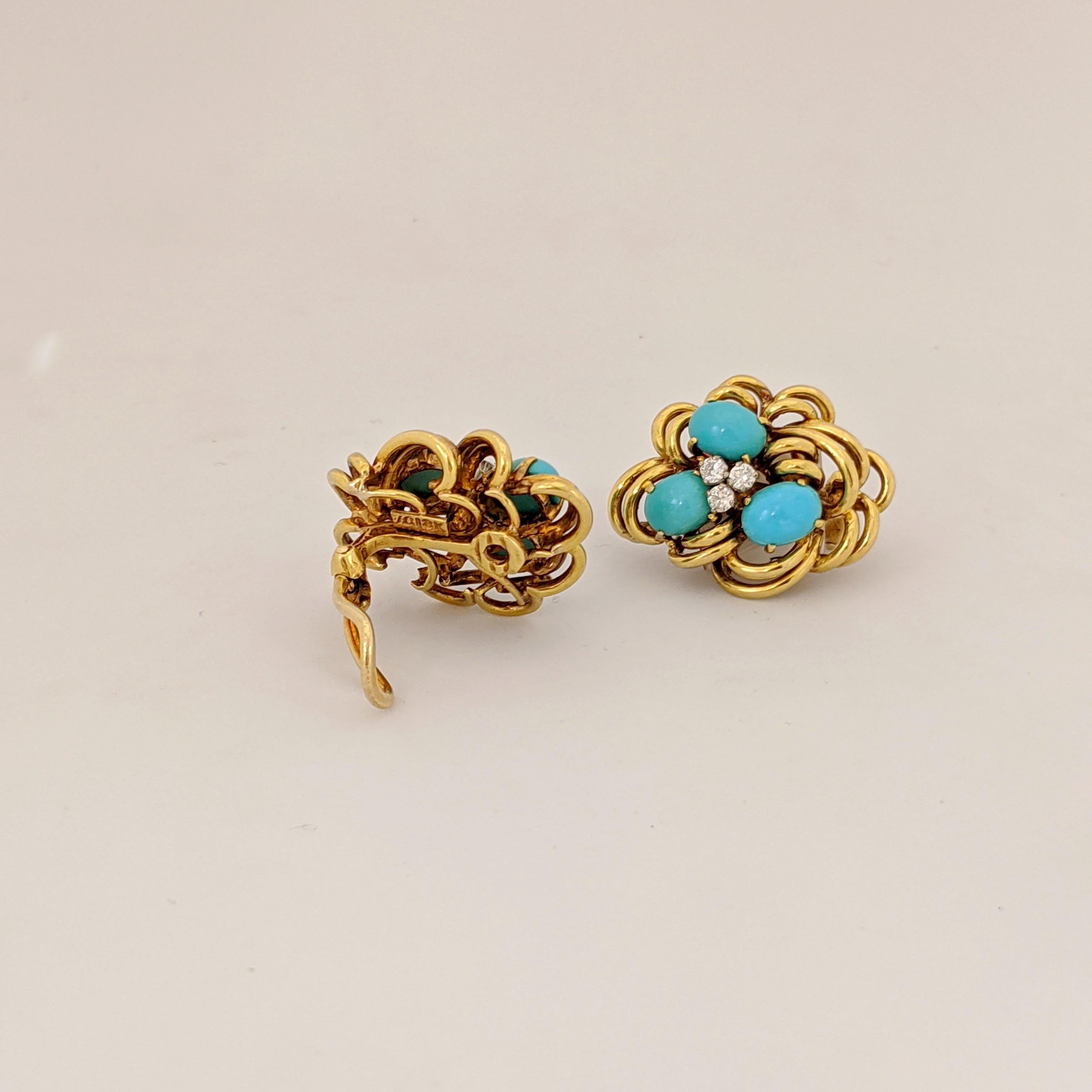 Beautiful 18 karat yellow gold cluster earrings centering three oval Turquoise stones, and three round brilliant cut  Diamonds in each earring. The earrings have a fold down post with a French clip back making them suitable for pierced and non