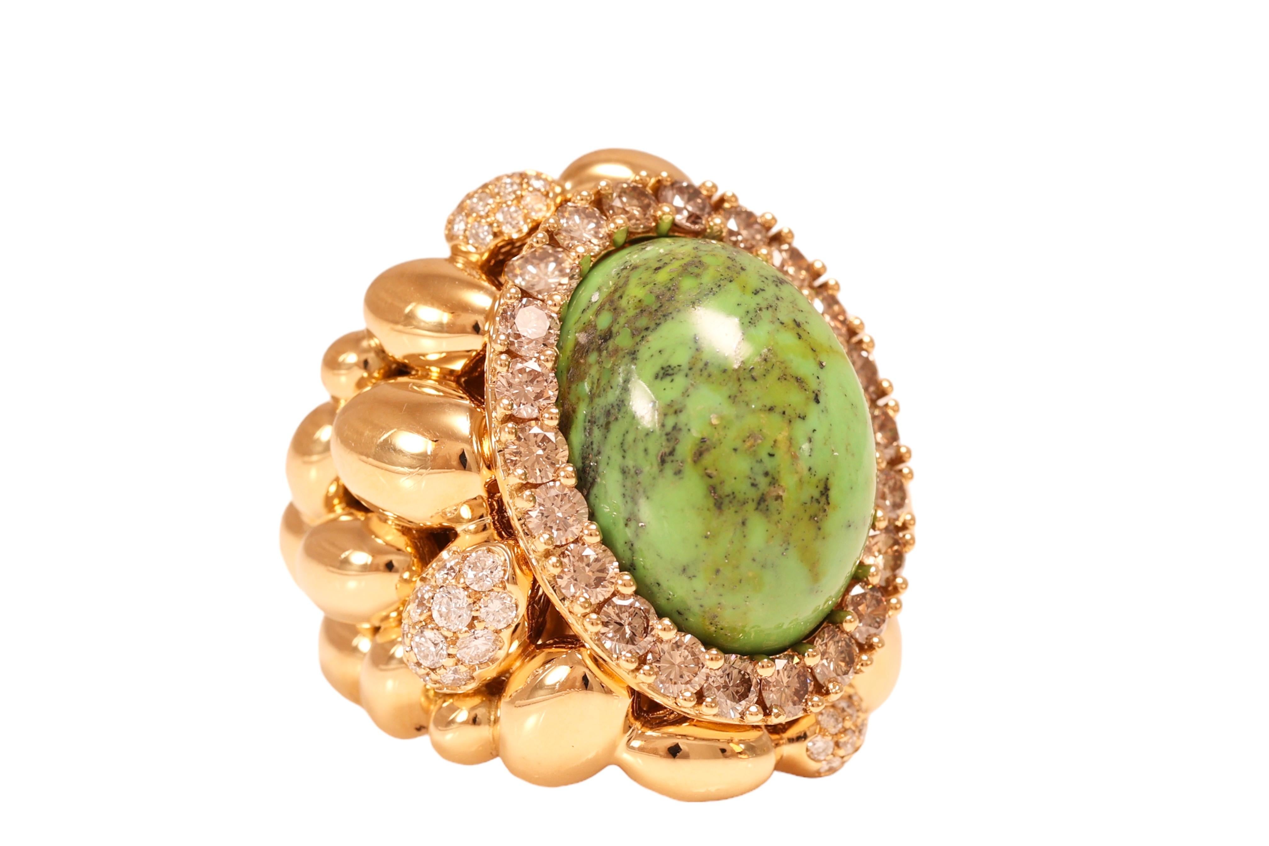 Fabulous Mattioli Ring with Big green stone and diamonds With Clusters of Polished Yellow Gold 

Diamonds: 62 Brilliant cut diamonds together 3.2ct 

Material: 18kt yellow gold

Ring size: 55.7 EU / 7.5 US ( can be resized for free)

Total weight: