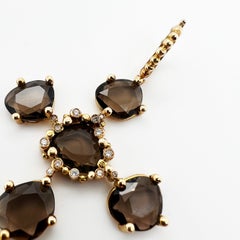 18kt Yellow Gold Cross pendant with smoky quartz and natural diamonds
