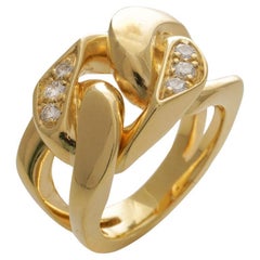 18kt. yellow gold curb link ladies band ring with diamonds 