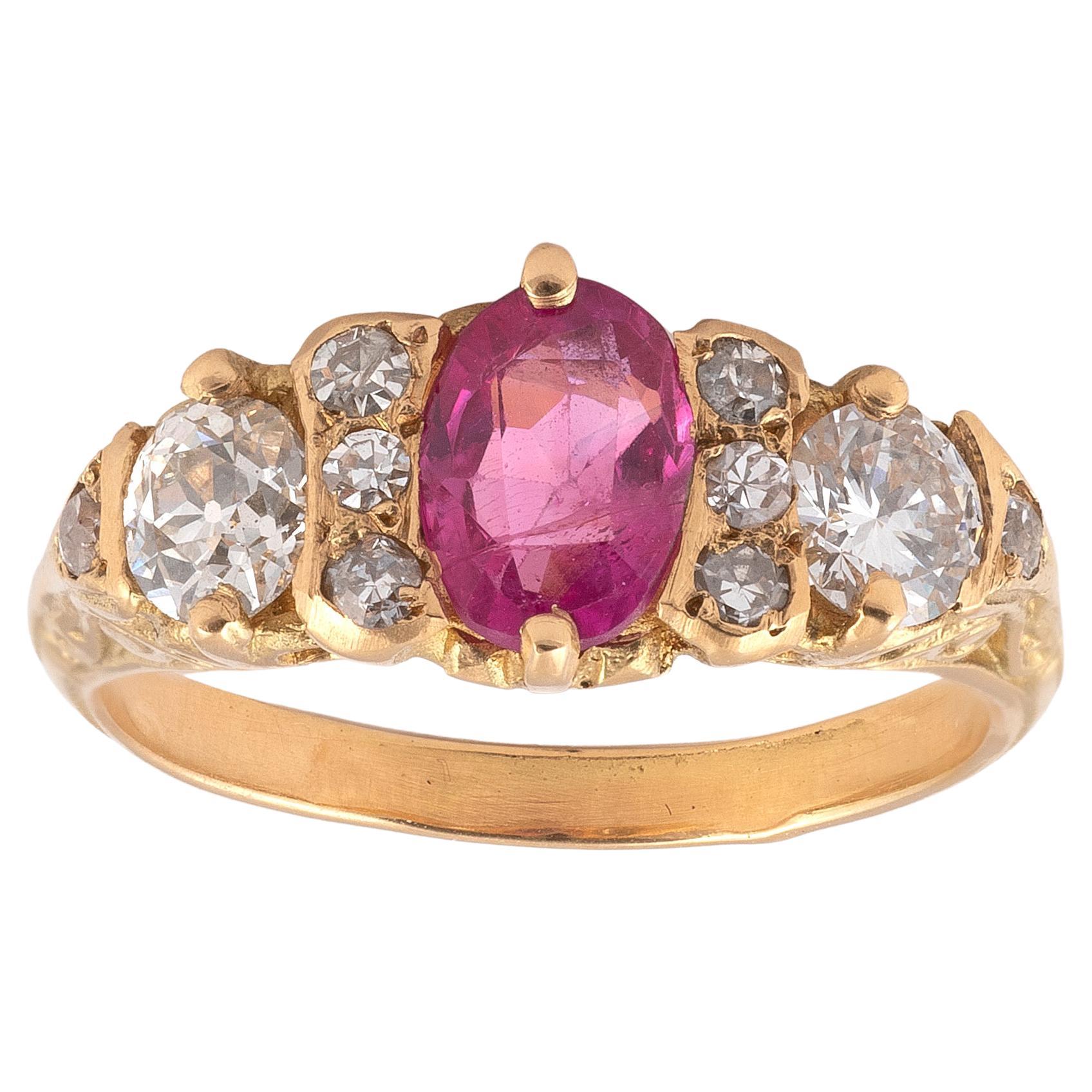 Anneau en or jaune 18 carats avec diamants et saphirs roses