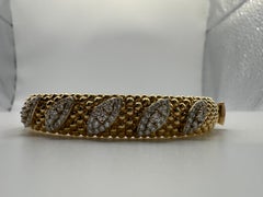 18KT yellow gold diamond bangle bracelet 18 grams VS diamonds