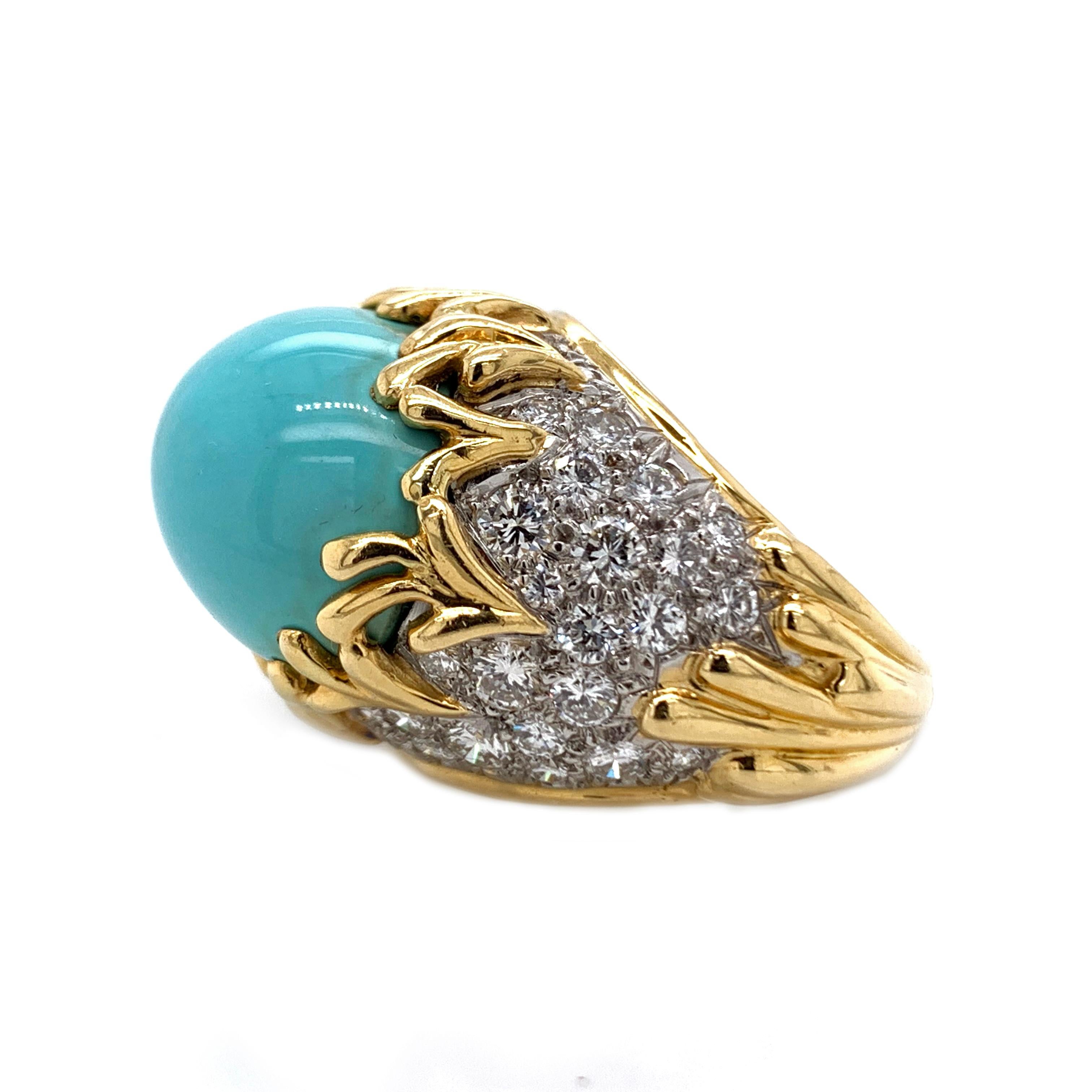 A, gorgeous 18kt yellow gold diamond and turquoise ring. In, a 18kt yellow gold polished finish. This is a US ring size 7.25 and weighs 25 grams. To, compliment the beautiful turquoise the ring is surrounded by beautiful round sparkling diamonds.
