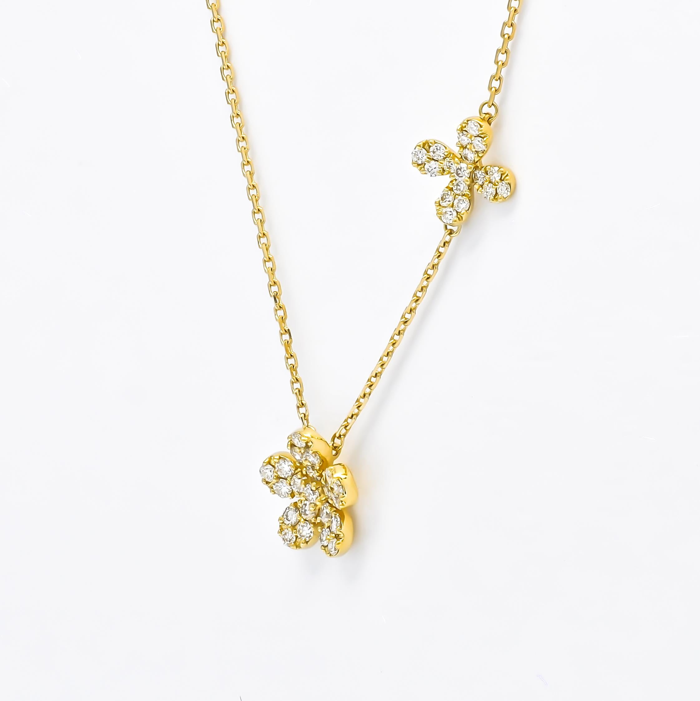 This exquisite necklace captures the essence of elegance, combining the brilliance of diamonds with the timeless allure of 18-karat gold.

At the heart of this pendant necklace lies a delicate and intricately designed flower motif. The petals of the