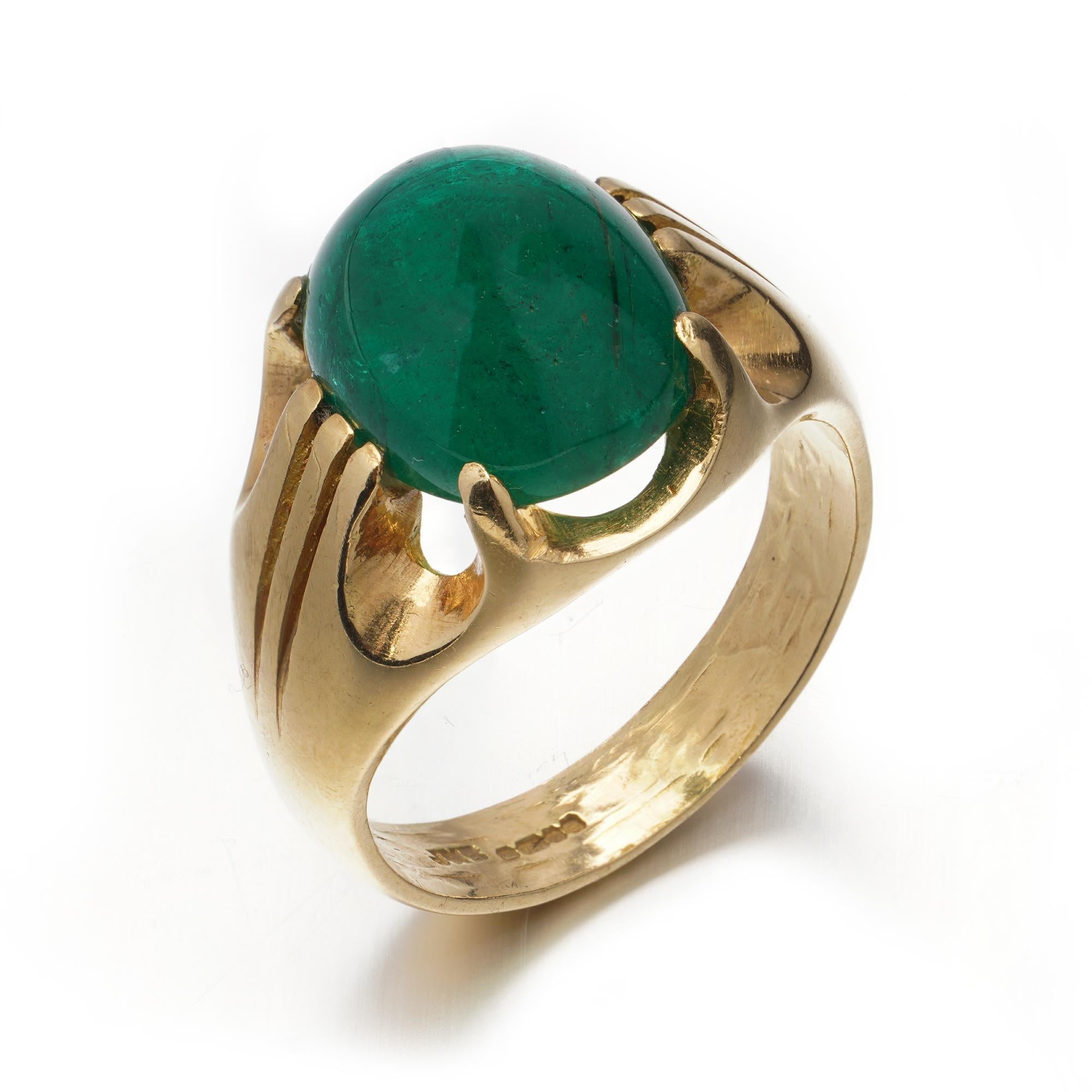 18kt. yellow gold dome 7.50 ct. cabochon emerald ring. 
Made in England, Birmingham, 2004
Hallmarked for 750 yellow gold and maker's mark JMB. 

The dimensions - 
Ring Size: Length x Width x depth: 3.1 x 2.3 x 1.6 cm 
Finger Size (UK) = R (EU) = 58