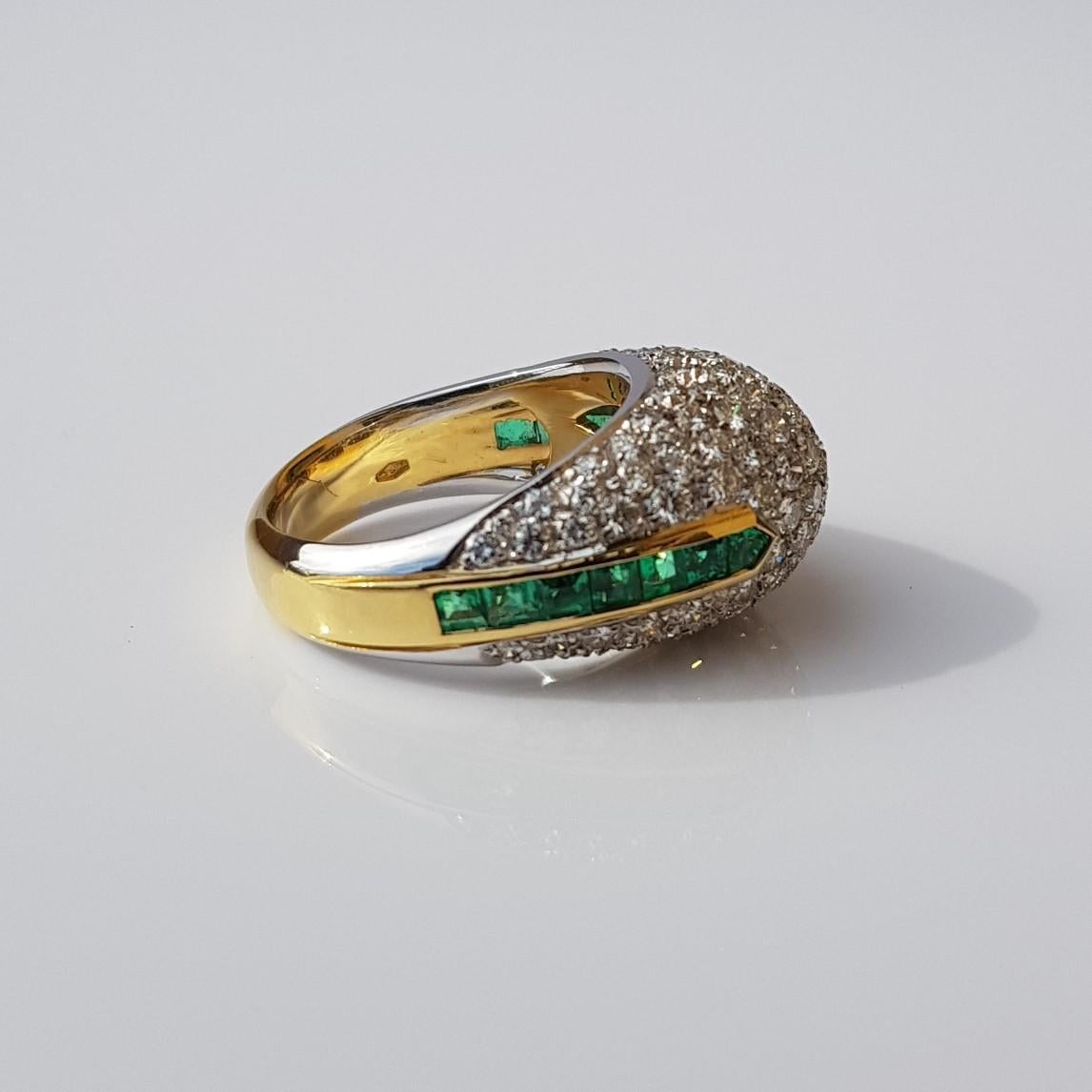 Dome ring set in 18KT yellow gold embellished with 2.41 carats of brilliant cut diamonds and 0.95 carats of emeralds.

Size 54 