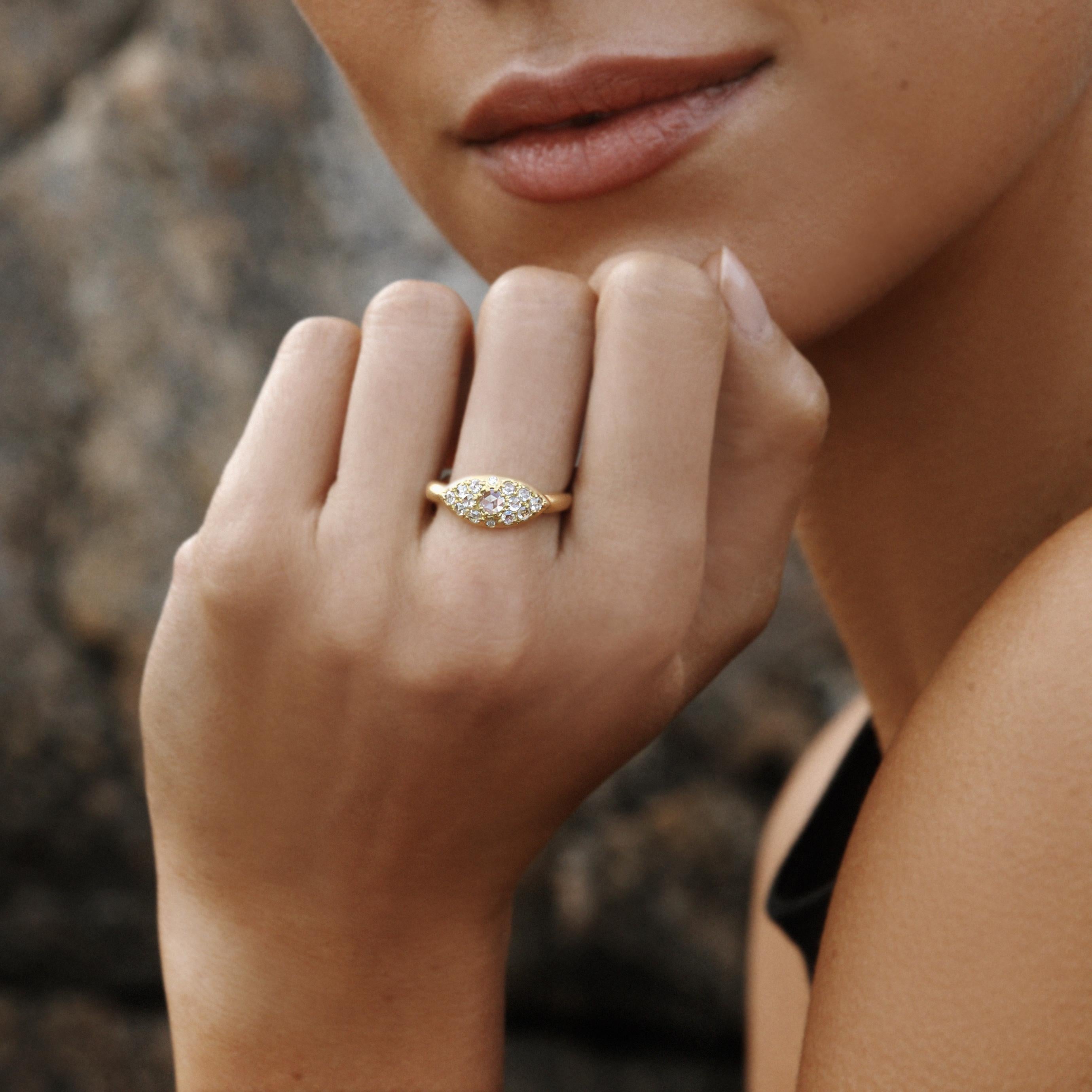 The 18kt yellow gold Classic Pillow ring is exceptionally lifestyle friendly with its contoured band which is flush to the finger. The captivating light play is created by white rose cut diamonds which cover the curved surface and display an endless