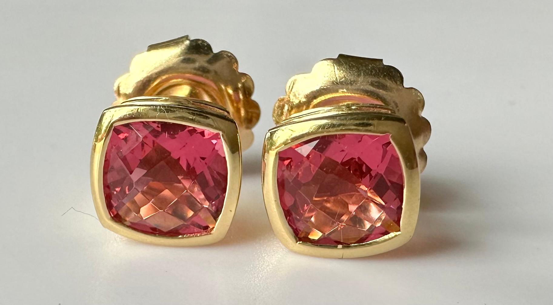 A pair of 18kt Yellow Gold Earrings set with 2 Cushion Checkerboard Cut Shocking Pink Tourmalines. Tourmalines are from the Minas Gerais state of Brazil. These Tourmalines are 2 of a larger parcel purchased by Kary Adam in Brazil and were selected