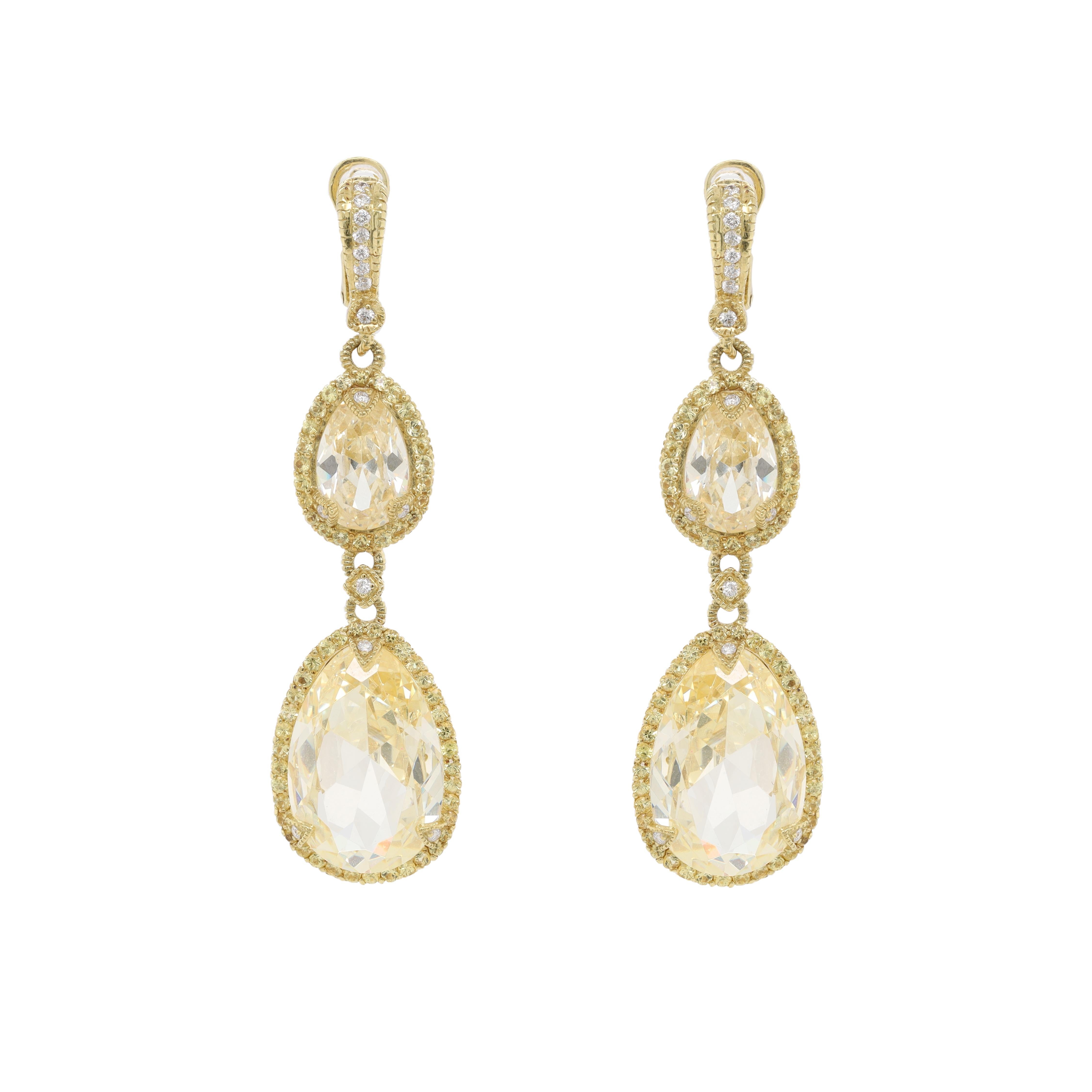 18kt yellow gold citrine, and yellow sapphire earrings, features 40.00ct of oval citrine, 5.00ct of yellow sapphires. 
