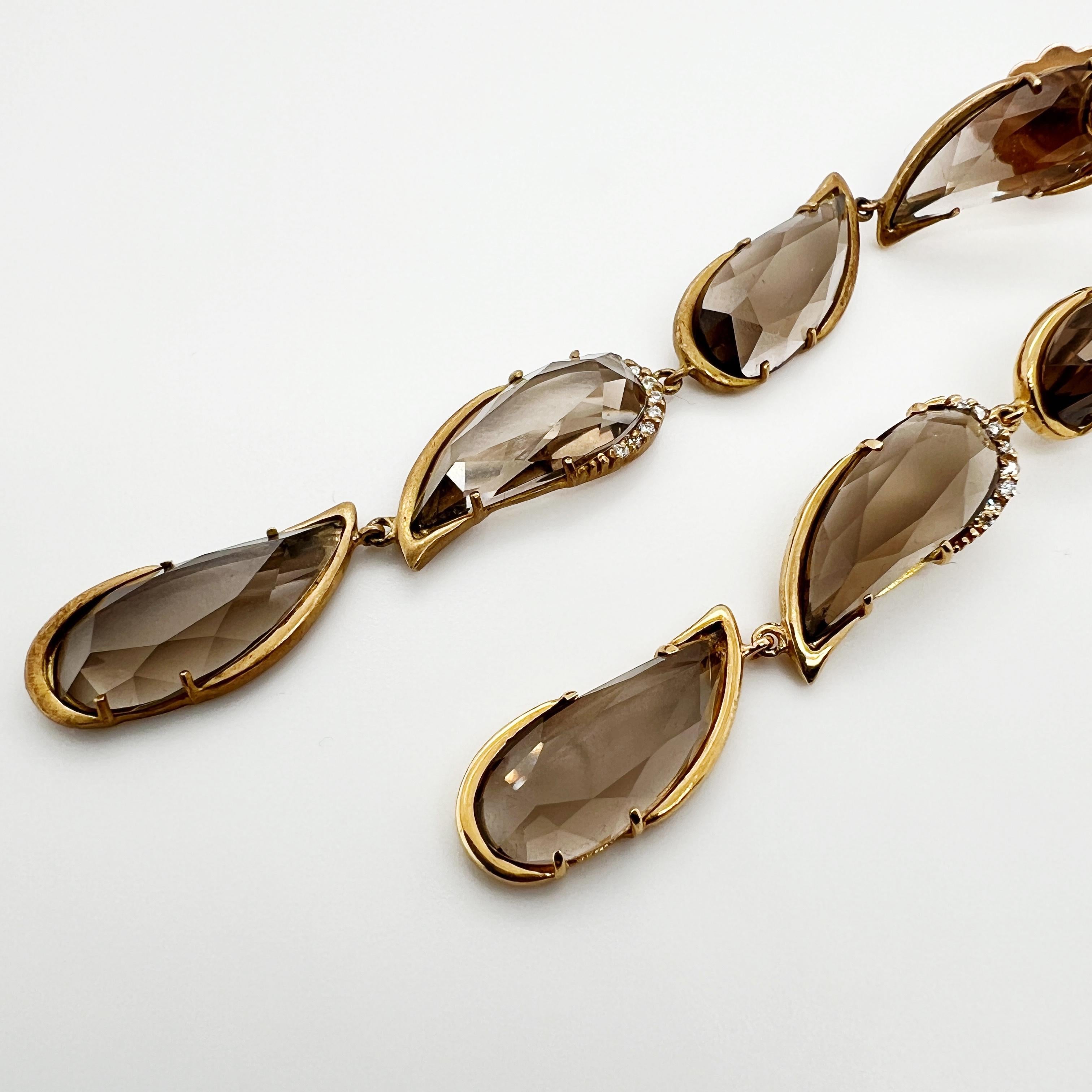 Modern 18kt yellow gold earrings with diamonds & asymmetric smoky quartz drops For Sale