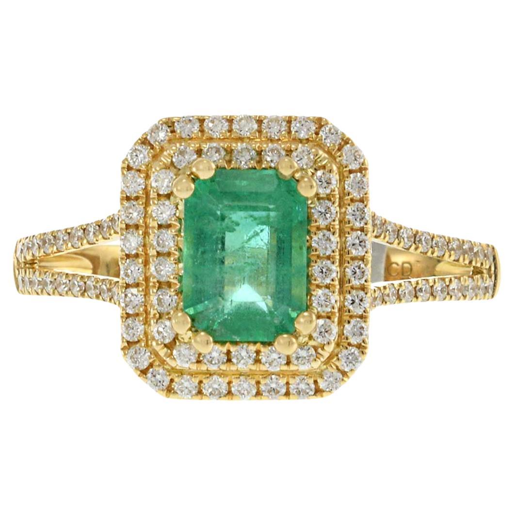 18KT Yellow Gold Emerald Cut Emerald and Diamond Double Halo Ring