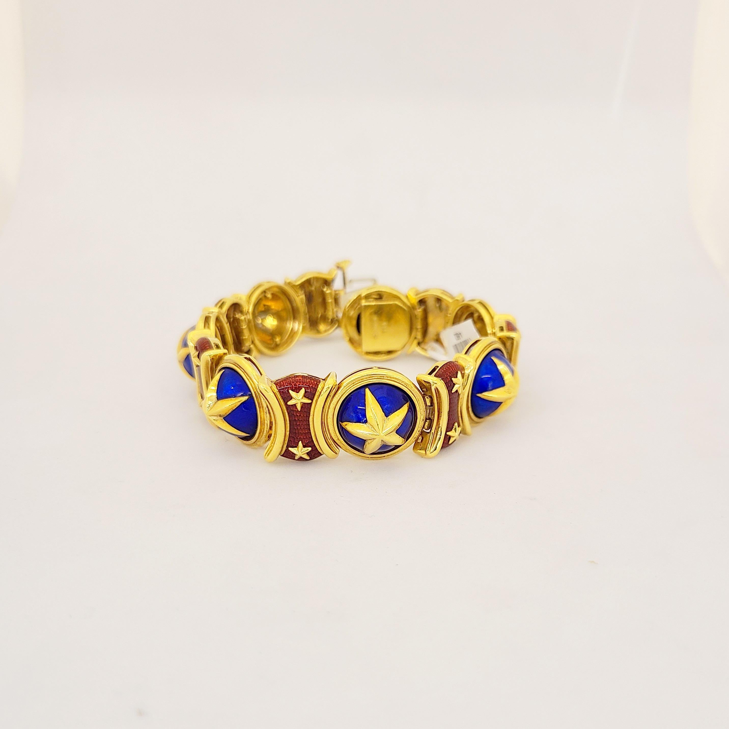 Classic 18 karat yellow gold bracelet designed with 14  alternating enamel links. A beautiful  gold star motif  on vibrant blue and red guicholled enamel. The bracelet measures 7.5