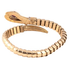 18kt Yellow Gold Garnet Diamond And Ruby Snake Bracelet