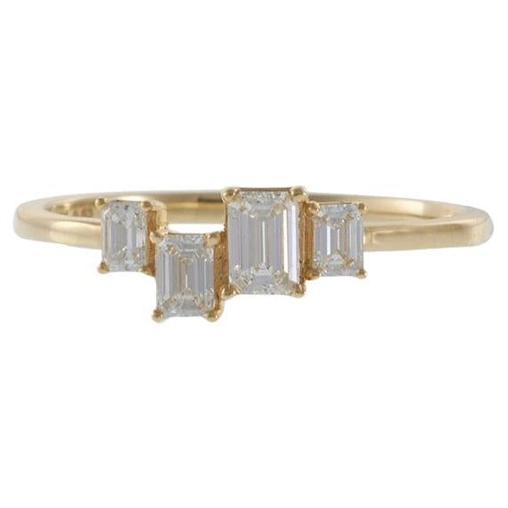 18KT Yellow Gold Graduated Emerald Cut Diamond Ring