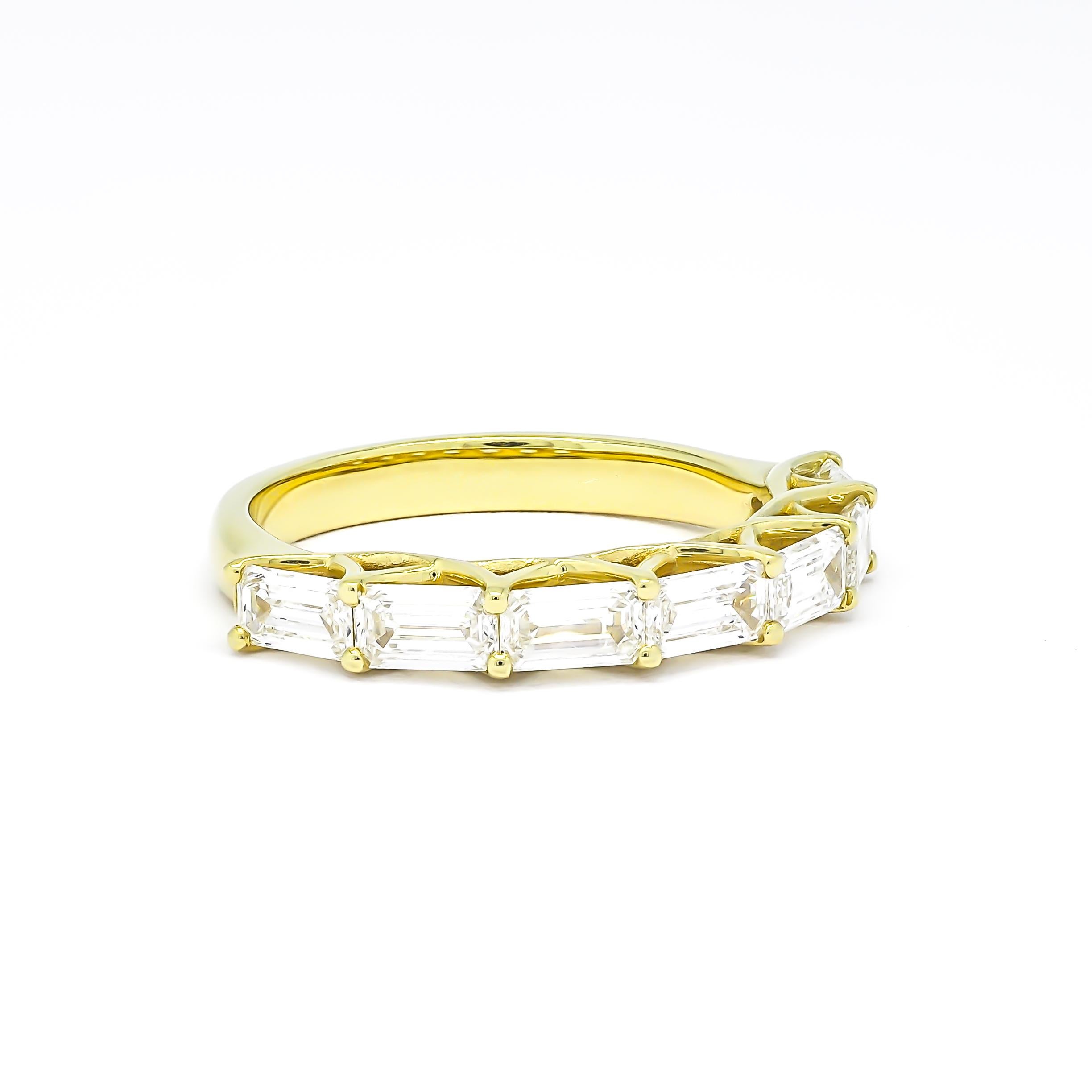 If you're looking for the perfect wedding band to symbolize your love and commitment to your wife, consider a 7 baguette diamond prong 18 kt yellow gold ring. This exquisite piece features seven beautifully cut baguette diamonds set in a secure