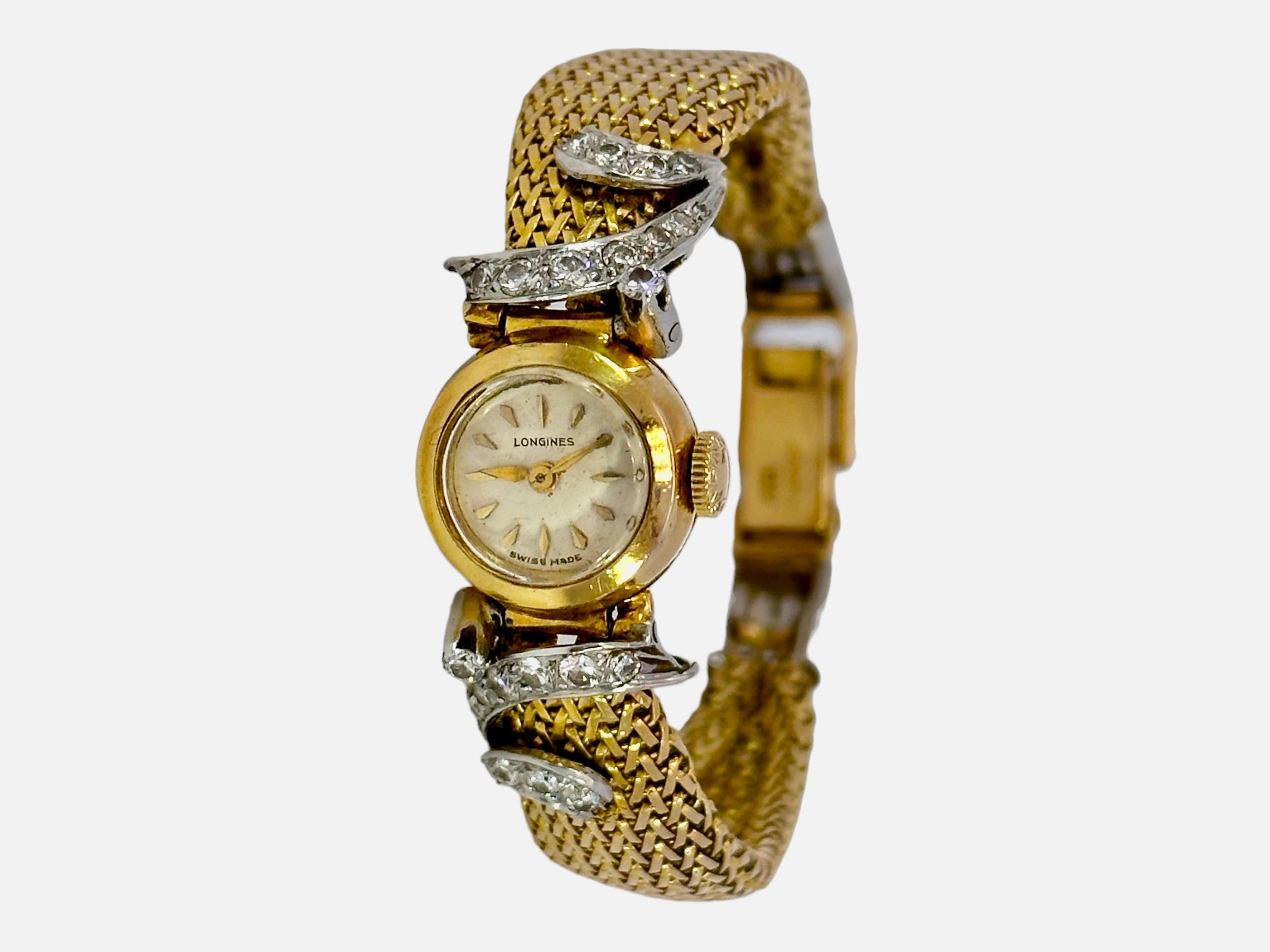 18Kt Yellow Gold Longines Lady Dress Watch with Diamonds

Movement: Mechanical Manual Winding

Case: 18kt yellow gold case, 13.5mm x 6.8mm

Dial: Gold dial with golden indexes

Bracelet strap: 18kt Yellow gold bracelet, with Round & Baguette