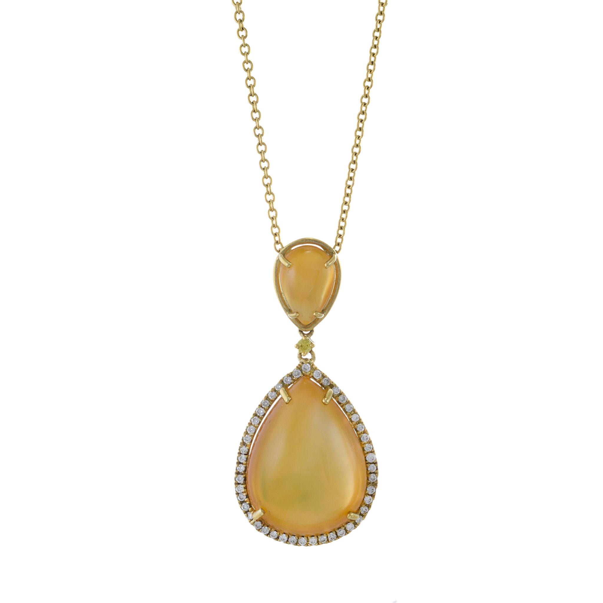 18KT Yellow Gold Double Halo Pendant Necklace. Featuring two cabochon lemon citrines set on mother of pearl for added luster, surrounded by 0.23ct-tw round-cut diamonds, this necklace is a unique and elegant piece. Crafted in luxurious yellow gold,