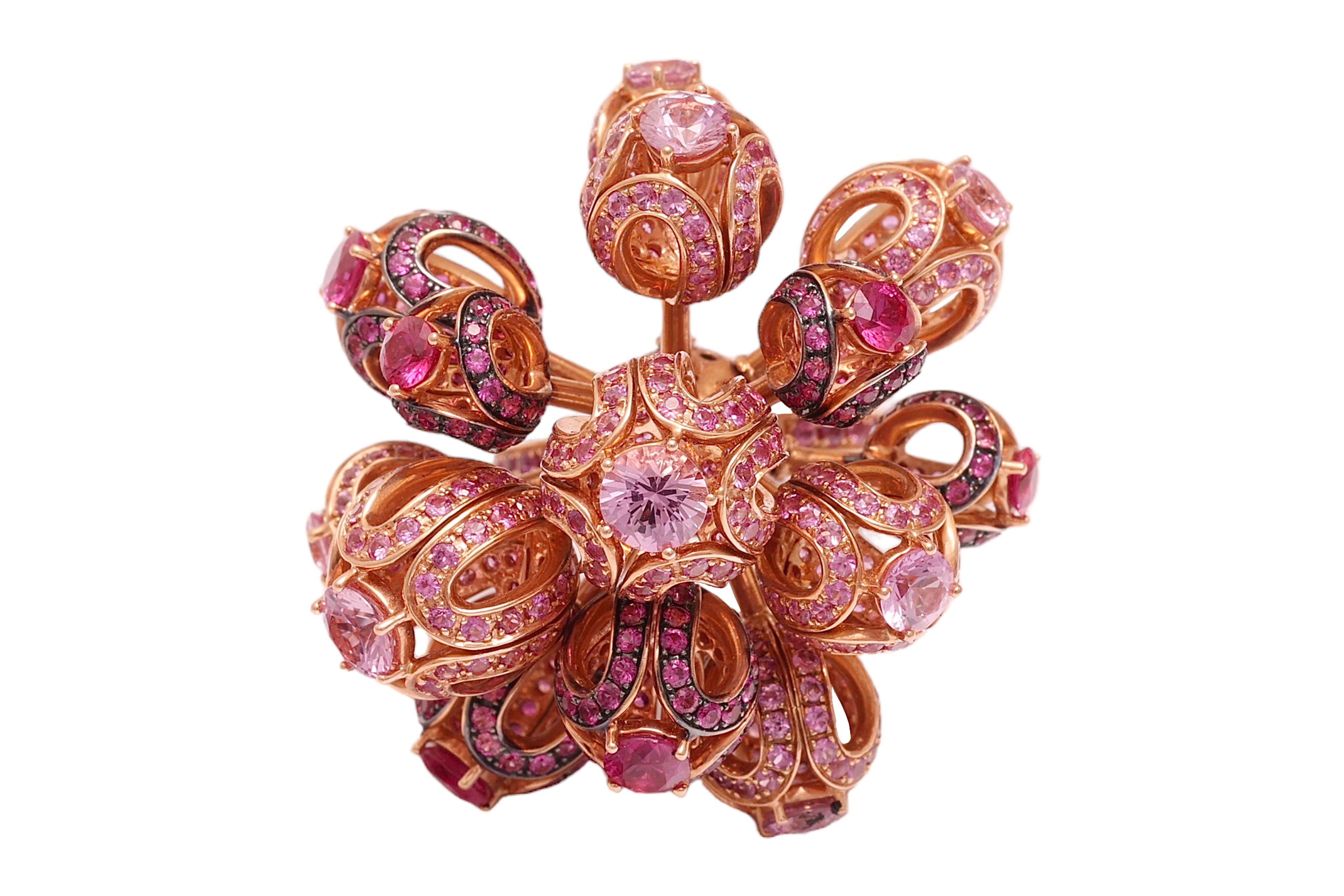 Very Rare and Beautiful 18kt Yellow Gold Moving Flower Ring Set with 15.65 ct Pink Sapphires

Sapphires: Hot pink and pink sapphires together approx. 15.65ct 

Material: 18kt Yellow gold

Ring size: 54 EU / 7 US ( can be resized for free)

Total