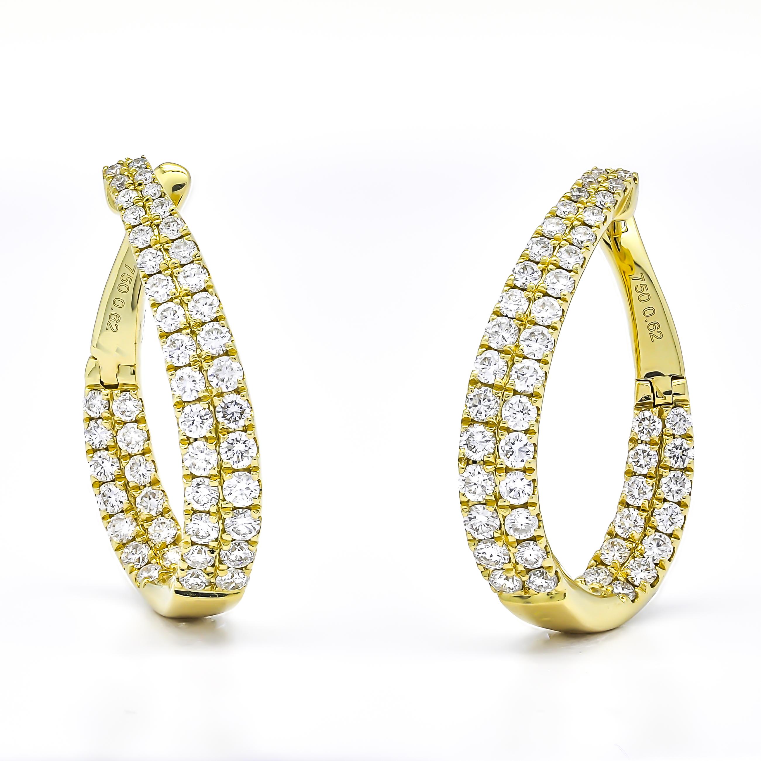 Cuando sólo tengas que brillar, prueba estos impresionantes pendientes de aro giratorio sofisticados con entrada y salida de diamante de talla redonda.

El glamour no tiene límites con estos absolutamente exquisitos pendientes de aro con diamantes