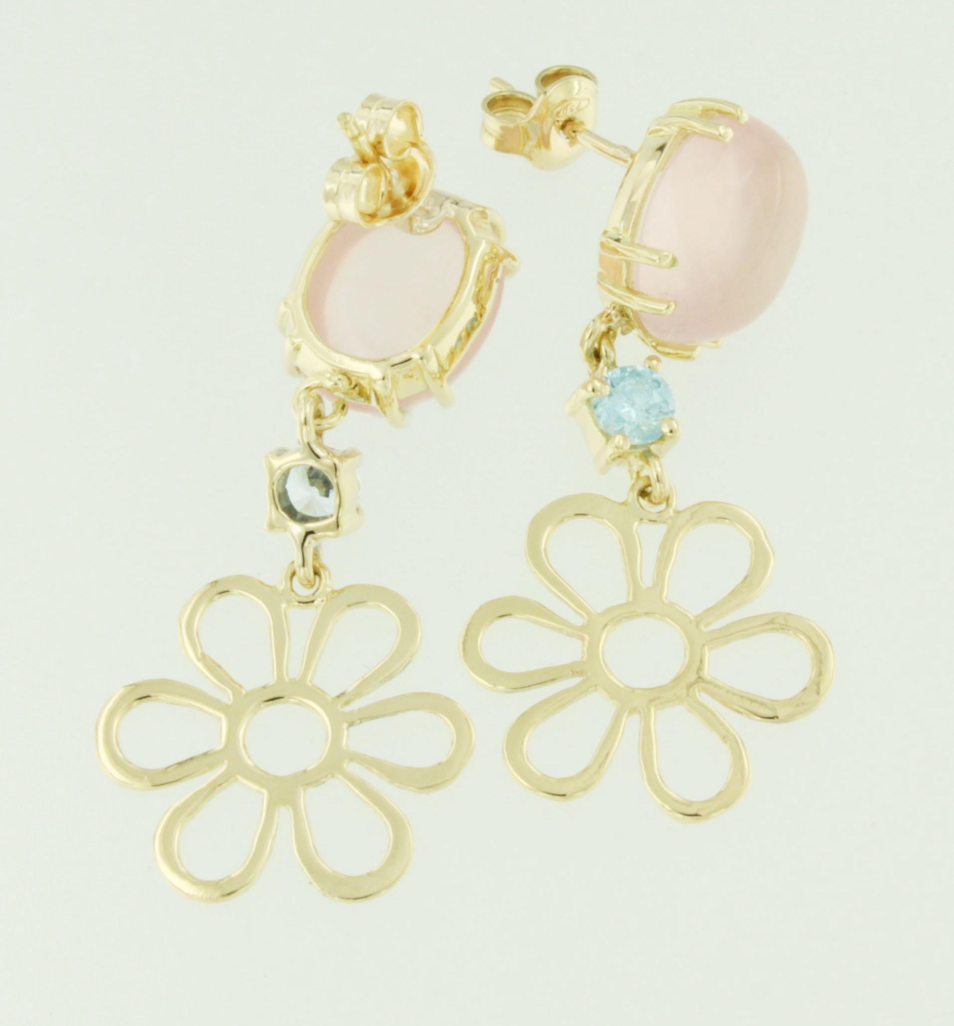 The daisy flower is a flower that grows with a unique eternal beauty, simple, elegant, unique.
Yellow gold with Blue Topaz, Pink quartz , earrings to wear every day for all occasions, inspired by nature and its beauties.
Everything made and designed