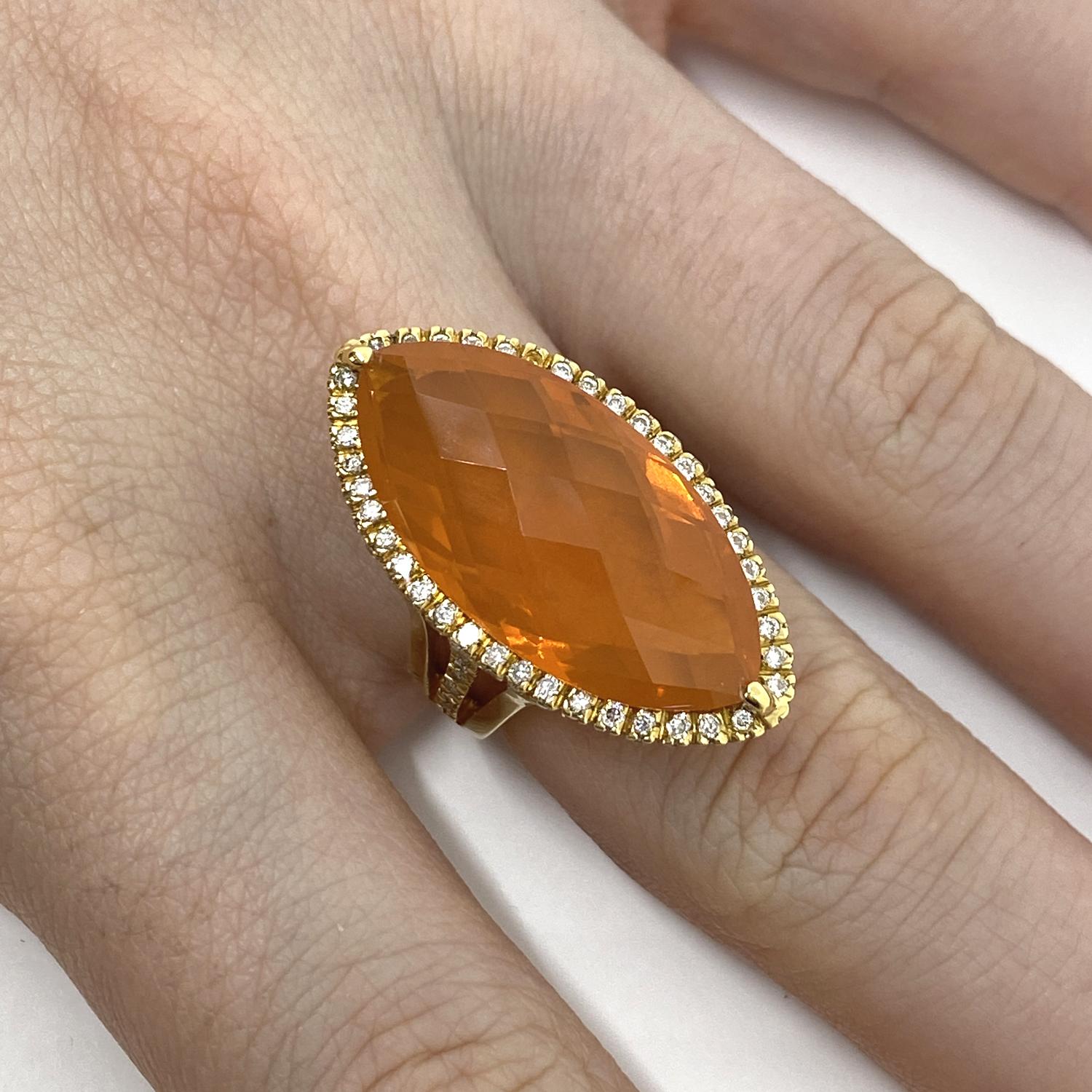 Ring made of 18 kt yellow gold with central Navette made of natural citrine quartz and outline of natural white brilliant-cut diamonds for ct.0.75

Welcome to our jewelry collection, where every piece tells a story of timeless elegance and