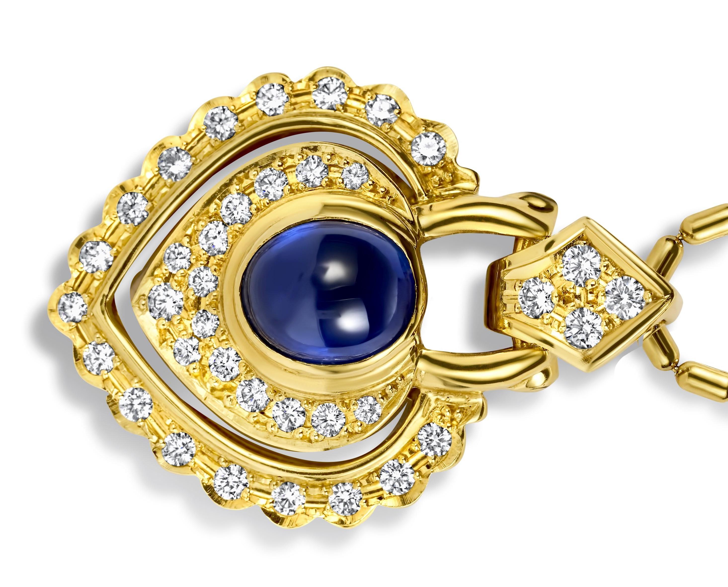 18kt. Yellow Gold Necklace, With Heart Shape Pendant and 2.89ct. Cabochon Sapphire with Beautiful Color & Diamonds 

Sapphire: Cabochon with amazing color  2.89 ct. 

Diamonds: brilliant cut diamonds together approx. 0.62 ct. 

Material: 18 kt.