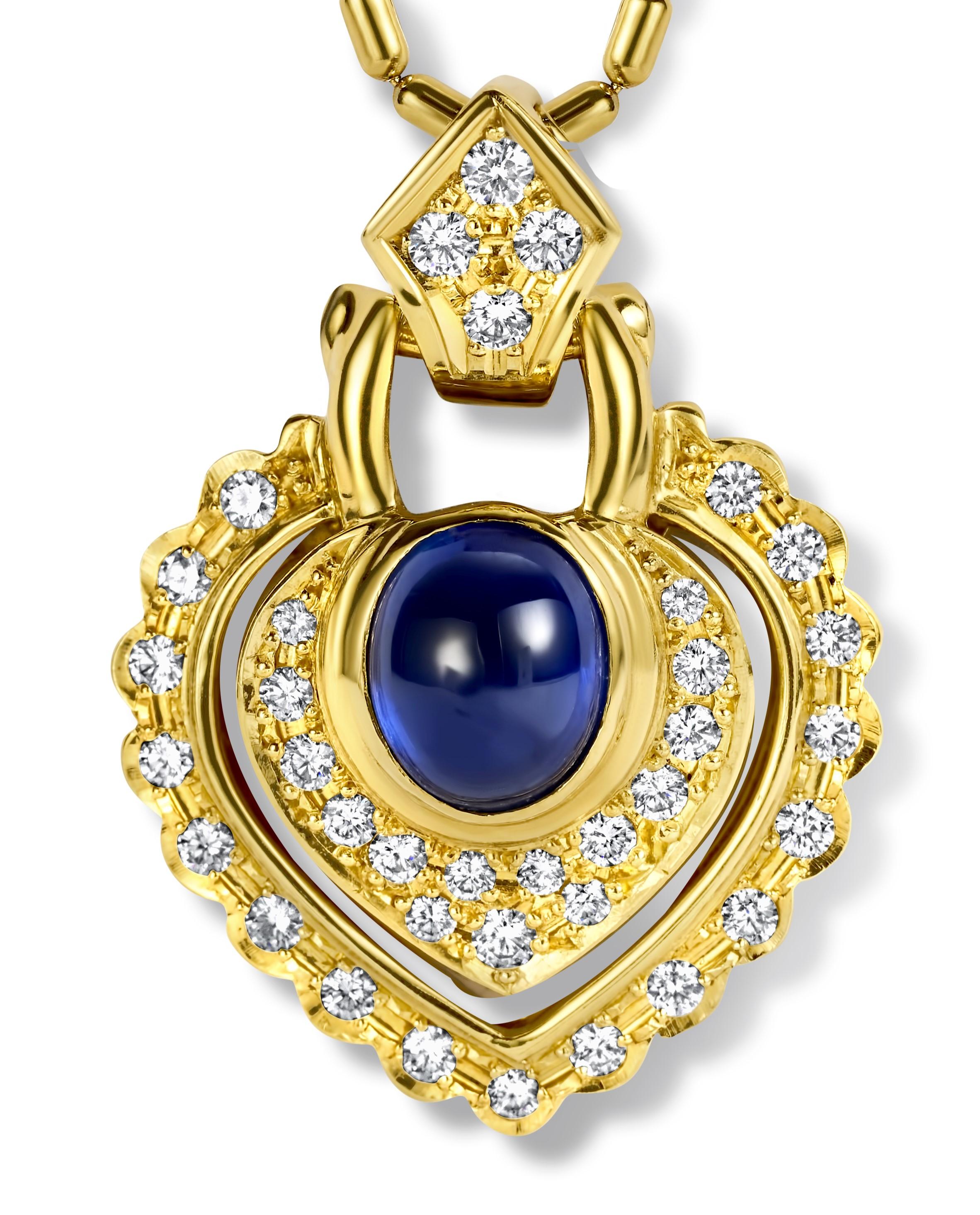 18kt. Yellow Gold Necklace, With Heart Shape Pendant and 2.89ct. Cabochon Sapphire with Beautiful Color & Diamonds 

Sapphire: Cabochon with amazing color  2.89 ct. 

Diamonds: brilliant cut diamonds together approx. 0.62 ct. 

Material: 18 kt.