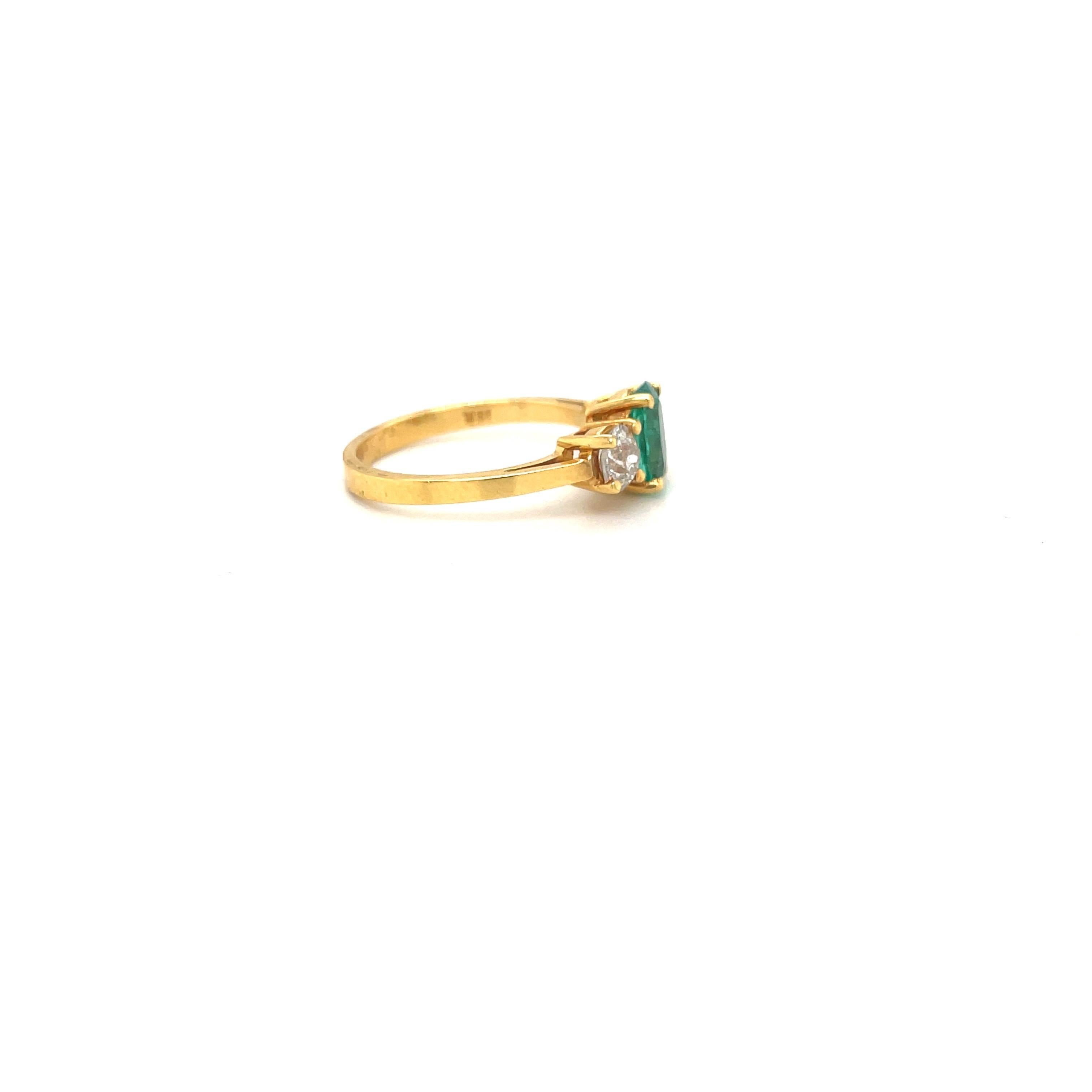 Oval Cut 18kt Yellow Gold Oval 57ct. Emerald and .46ct. Diamond Ring For Sale