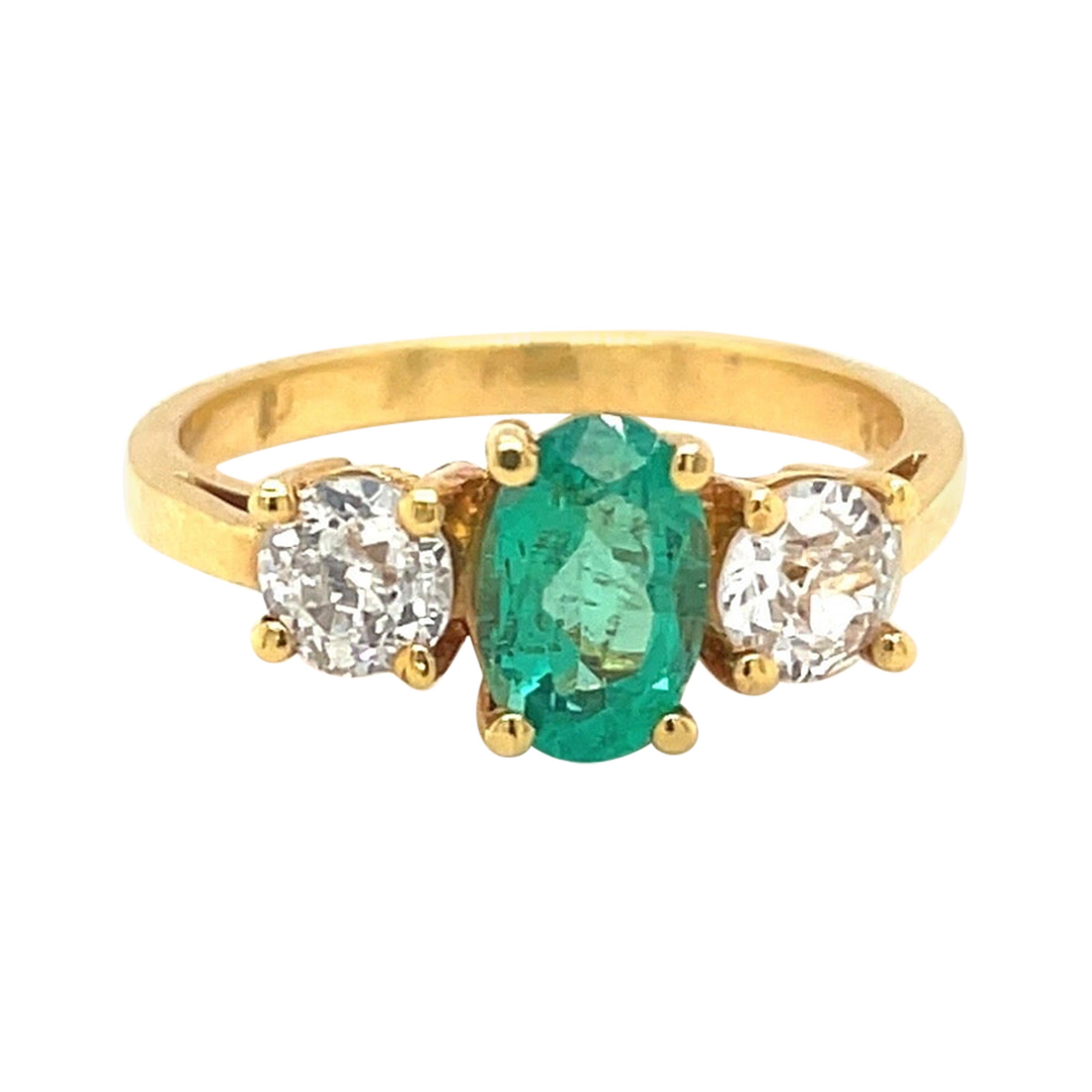 18kt Yellow Gold Oval 57ct. Emerald and .46ct. Diamond Ring